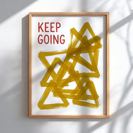 Motivational poster featuring the text Keep Going alongside abstract overlapping mustard yellow triangles.