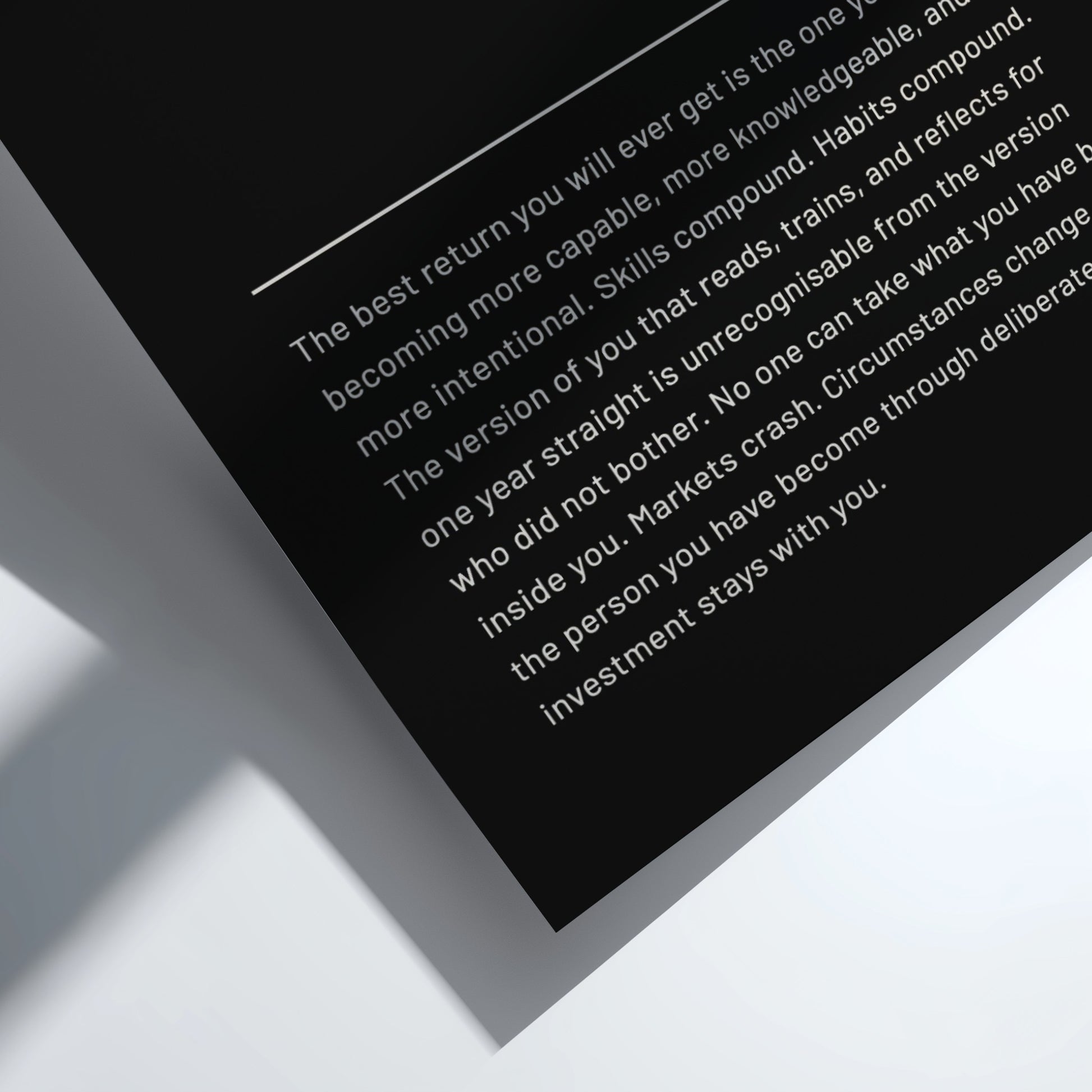 Framed motivational quote on a black background