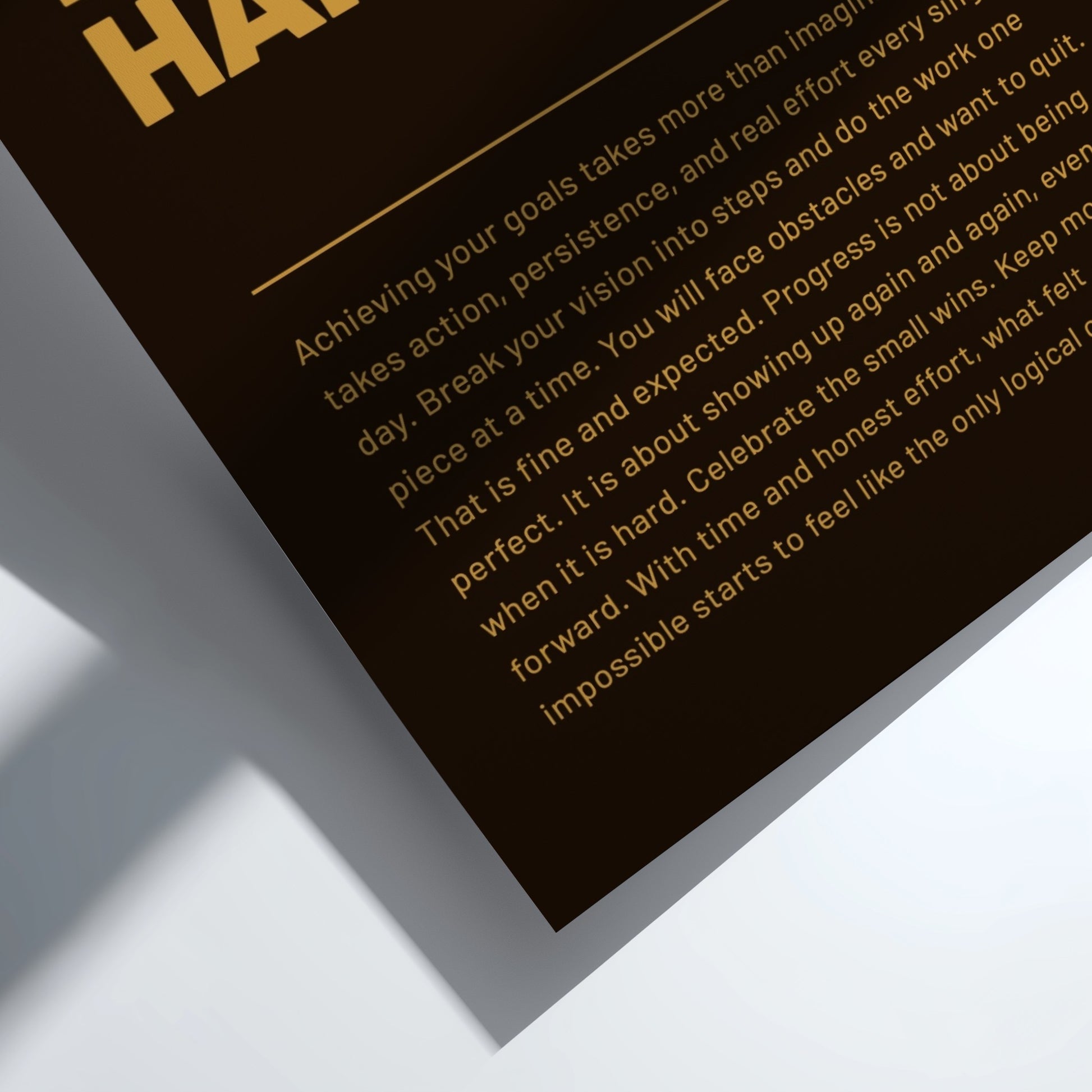 Motivational quote on a black background with gold text