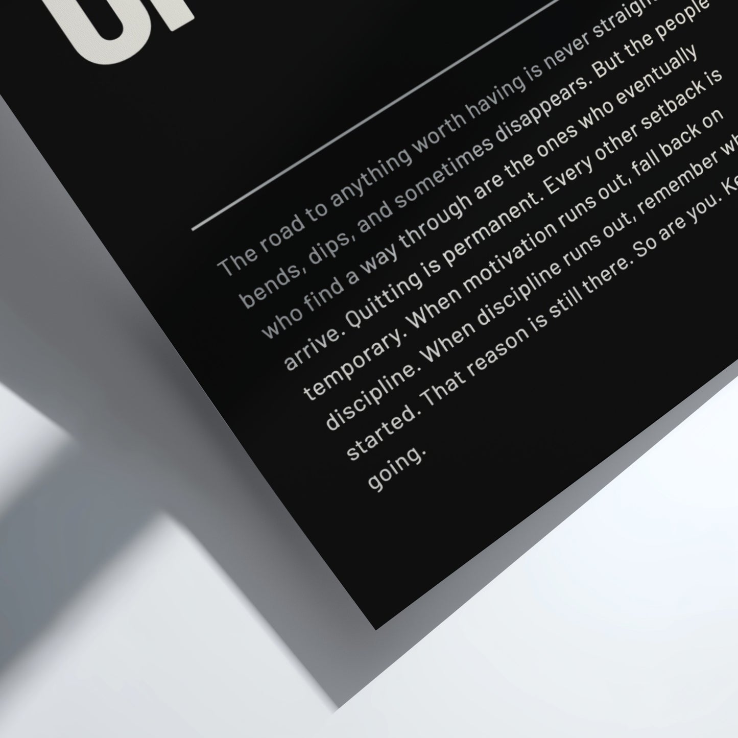 Motivational quote on a dark background with a white border