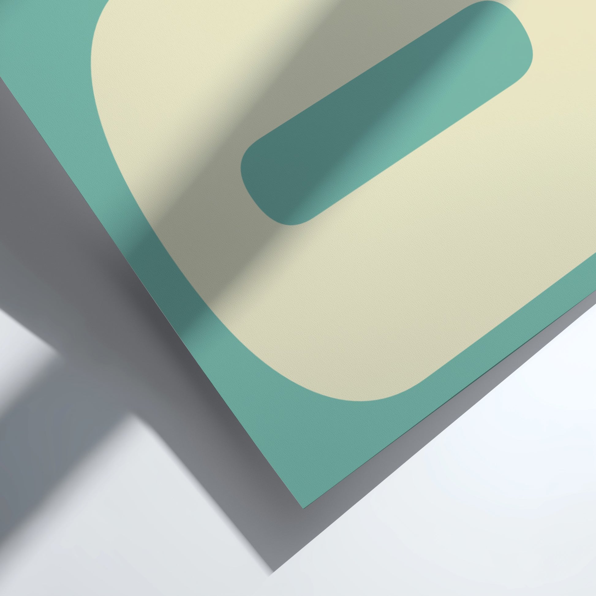Geometric shapes in teal, beige, and gray on a light background
