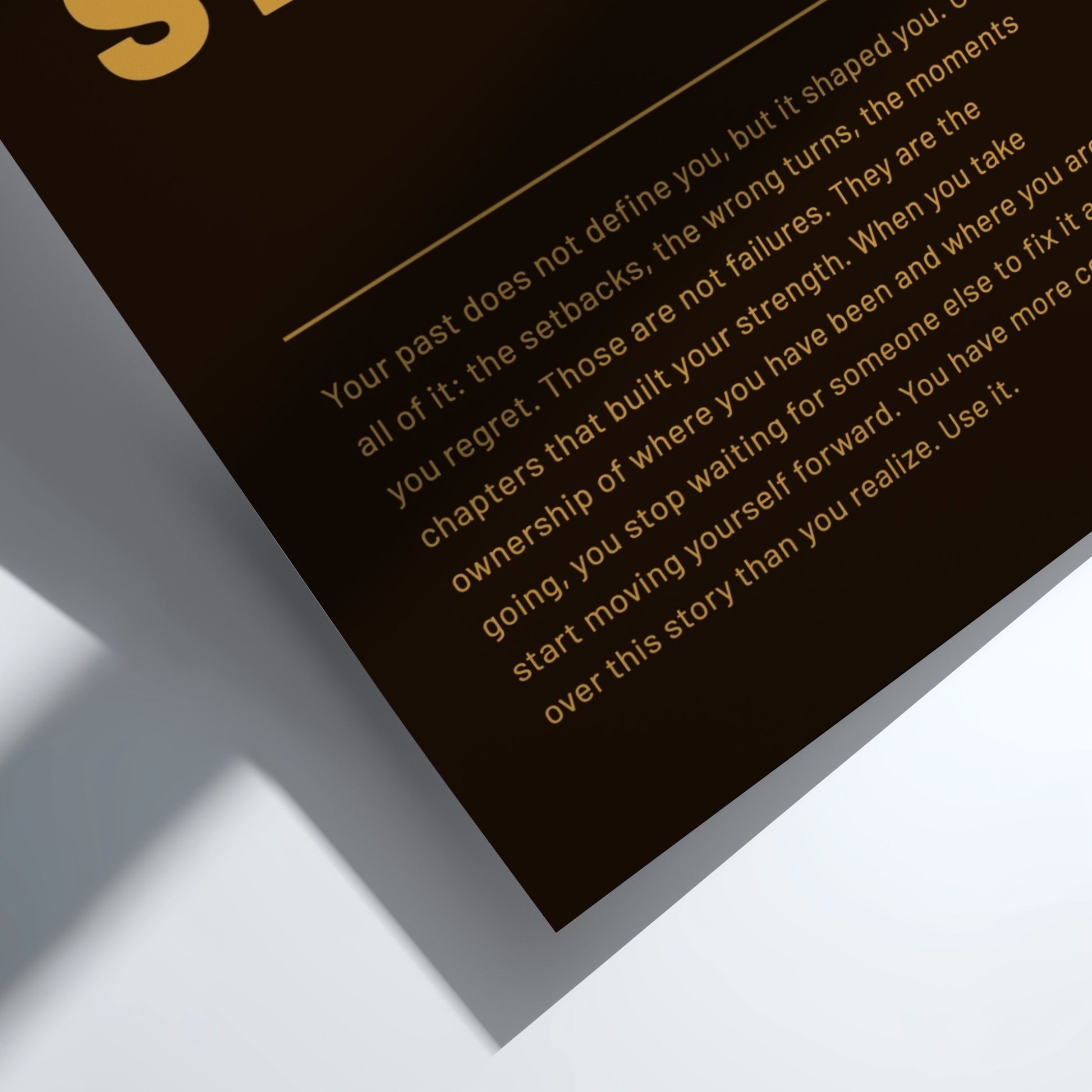 Motivational quote on a black background with gold text