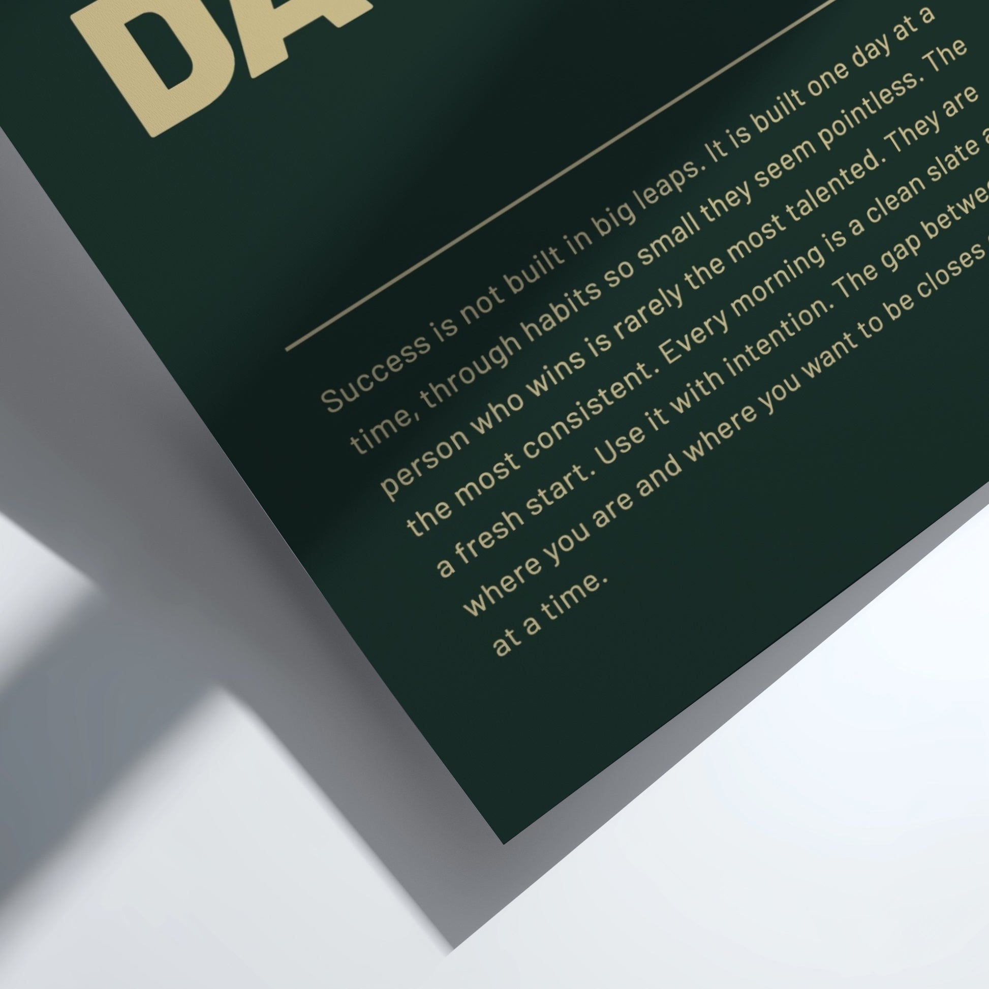 Motivational quote on a dark green background with gold lettering.