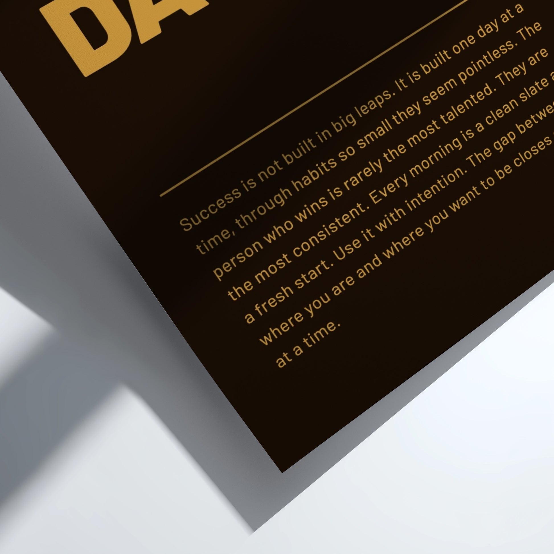 Motivational quote on a black background with gold text.