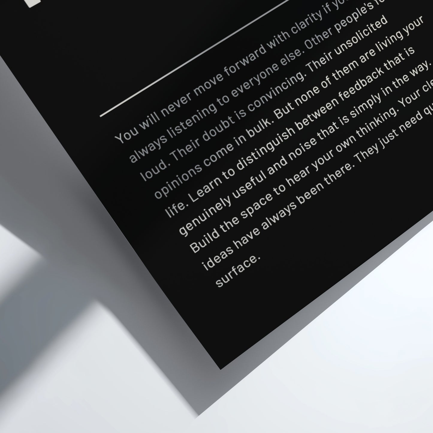 Text on a black background with a white border