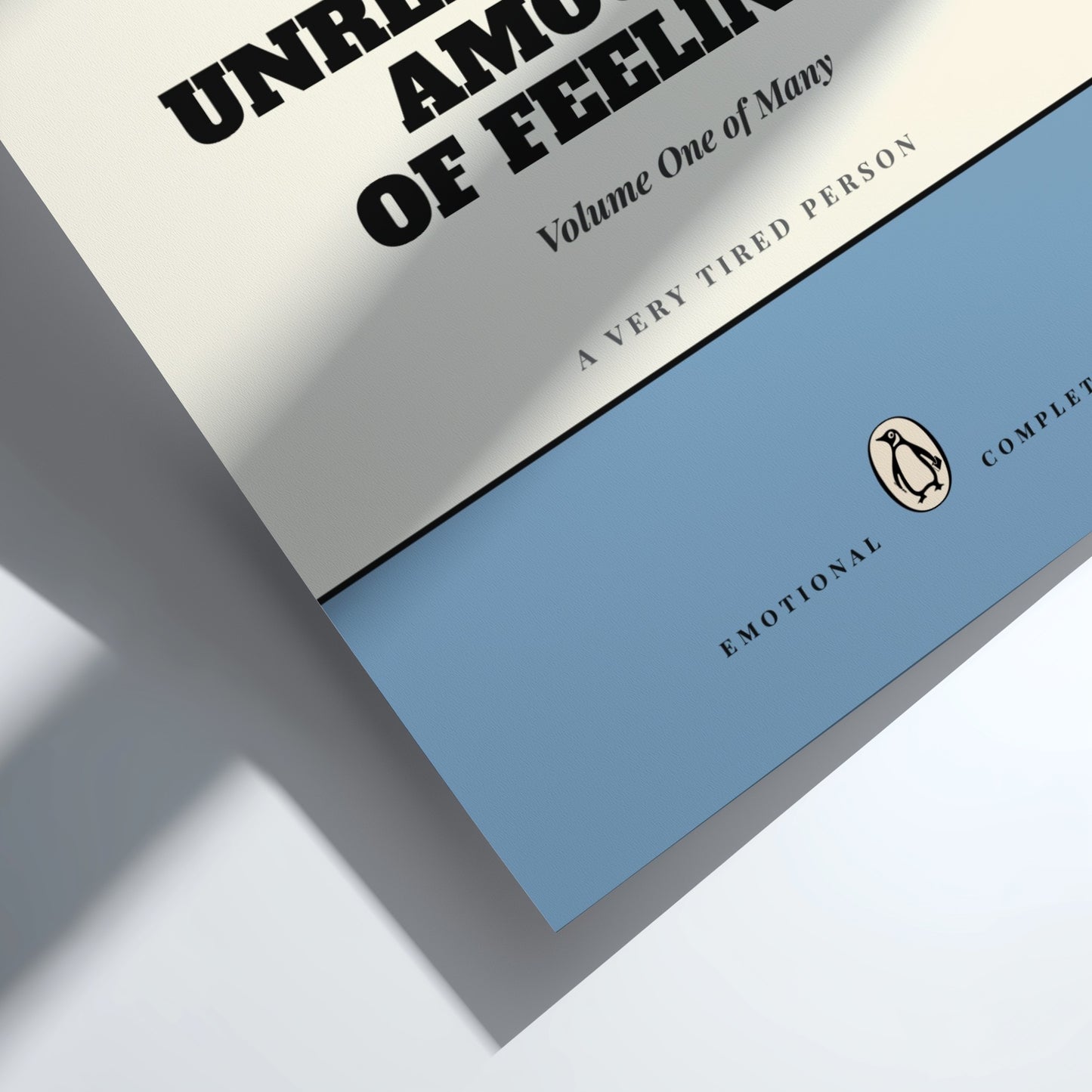 Close-up of a book titled 'A Very Tired Person' with a blue cover on a white background