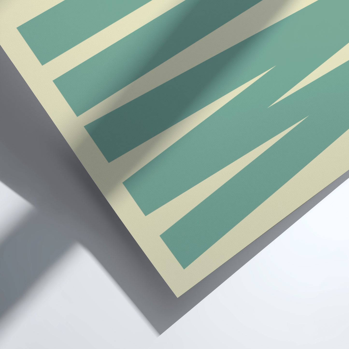 Teal and beige striped pattern on a flat surface