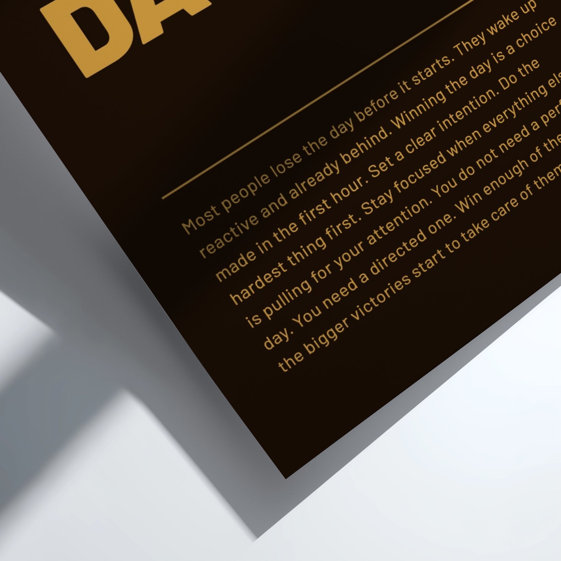 Motivational quote on a black background with gold text