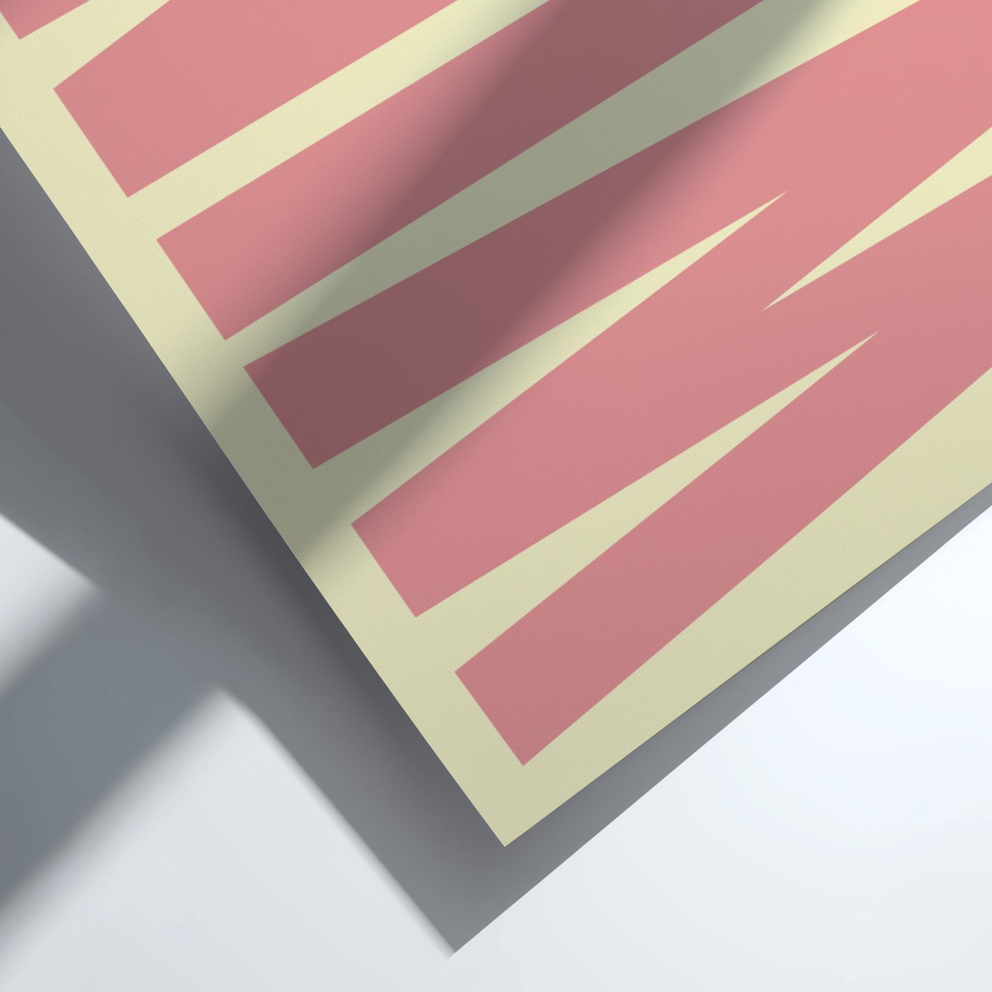 Close-up of a pink and beige color swatch card