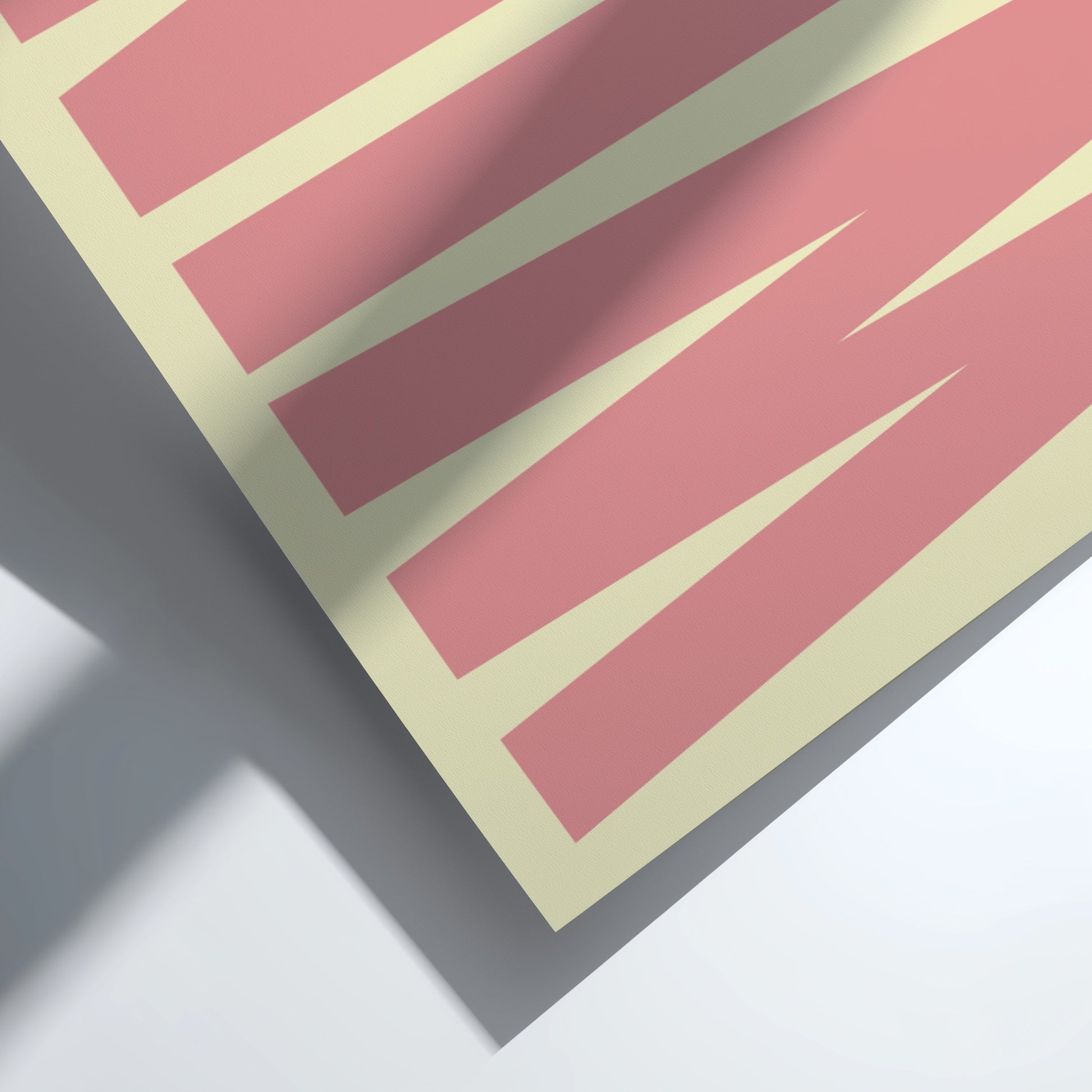 Close-up of a pink and beige color swatch card