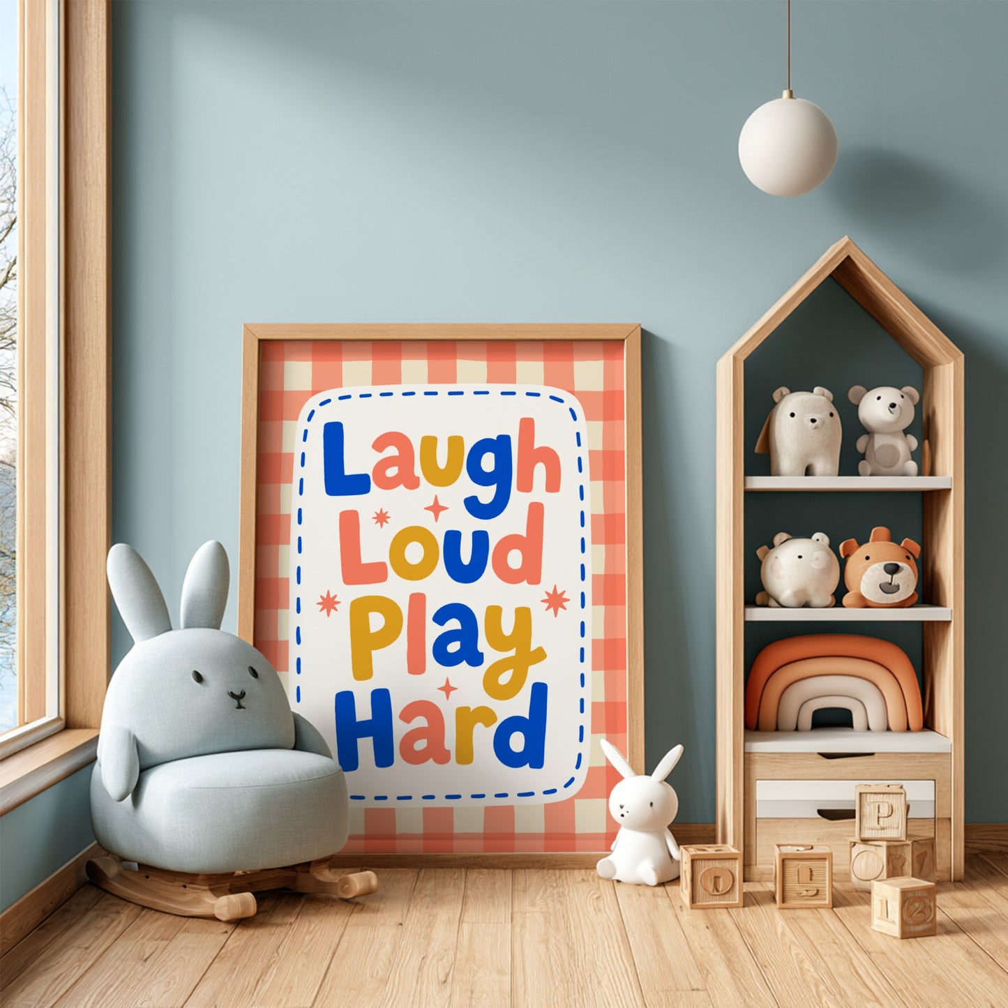 Kids room poster with colorful typography design featuring 'Laugh Loud Play Hard' for nursery decor.