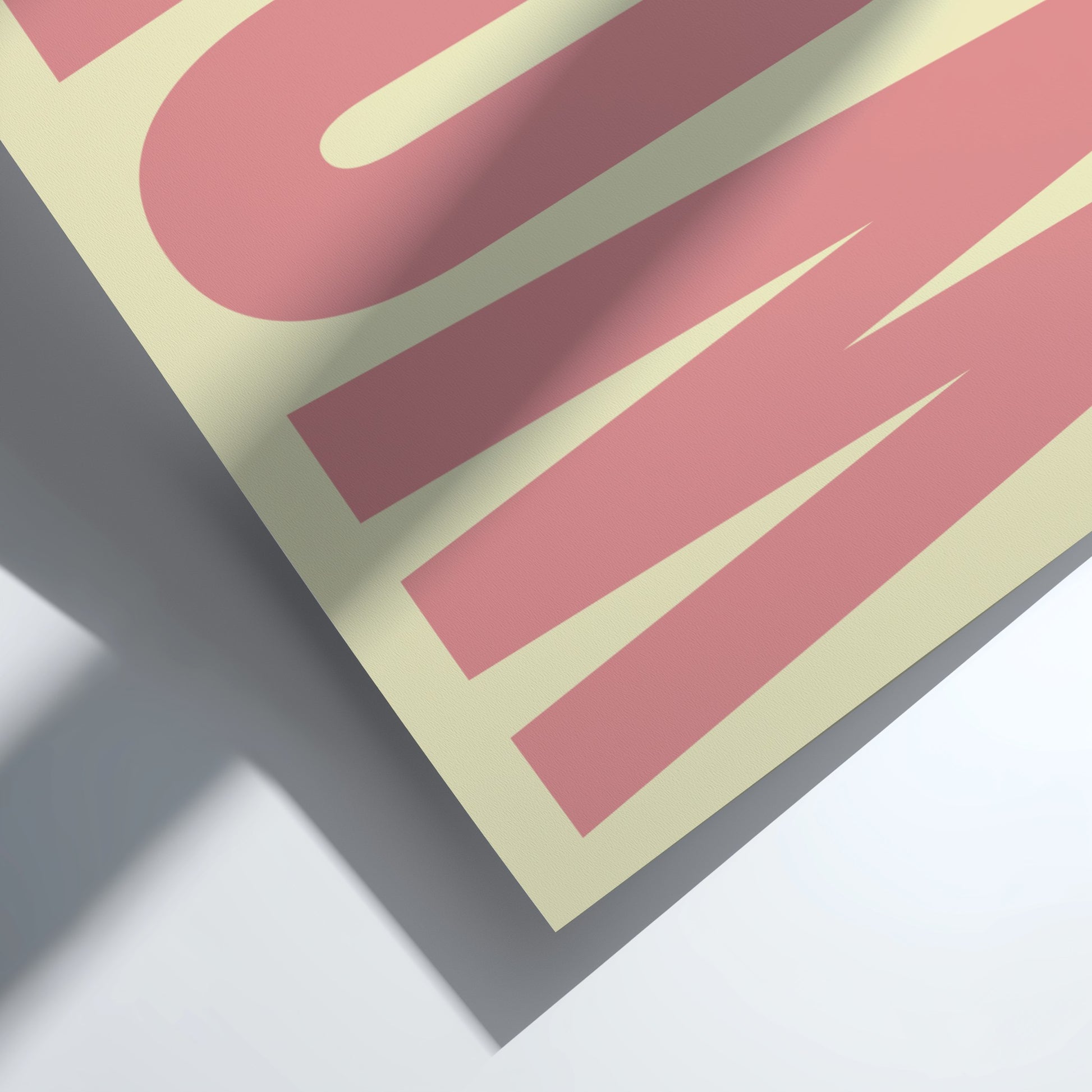 Close-up of a pink and beige artwork with the word 'WOW' design on a white background