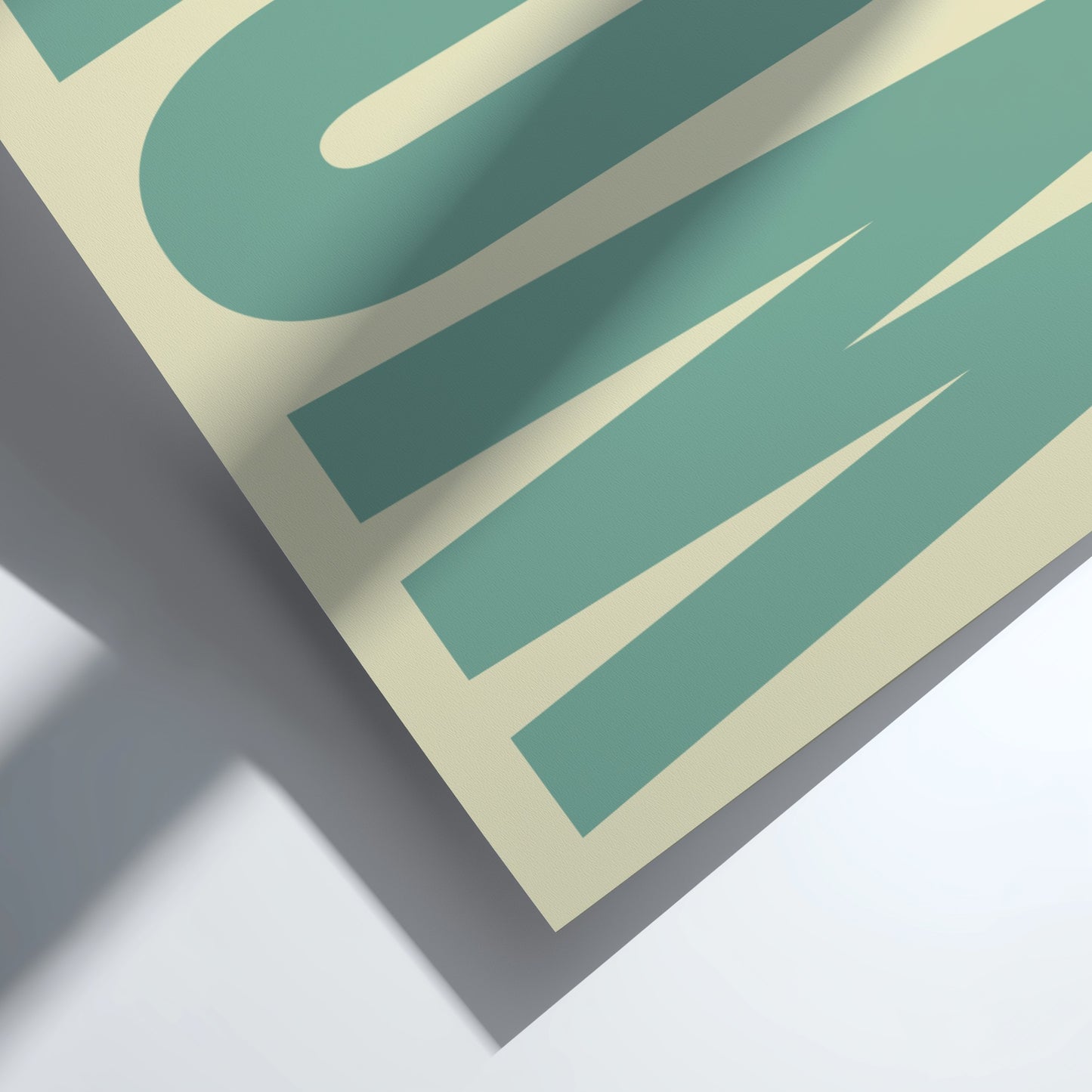 Close-up of a green and beige sign with text on a white background