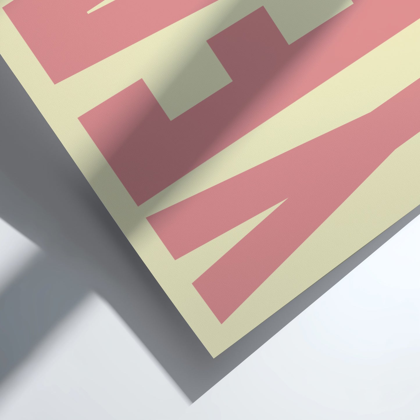 Close-up of a pink and beige Motivational poster featuring bold 'Yeah' typography 