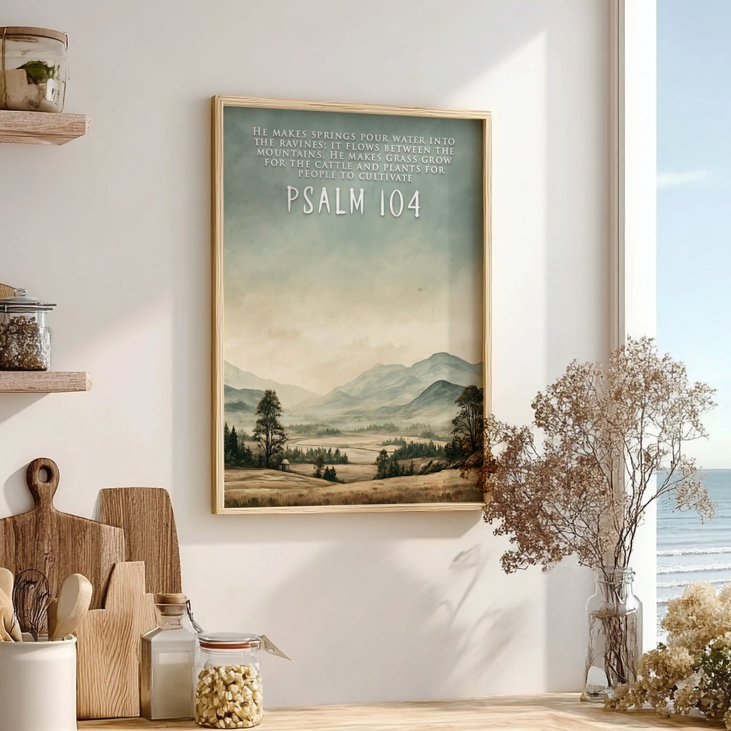 Poster featuring a serene mountain landscape with soft green and earthy brown tones.
