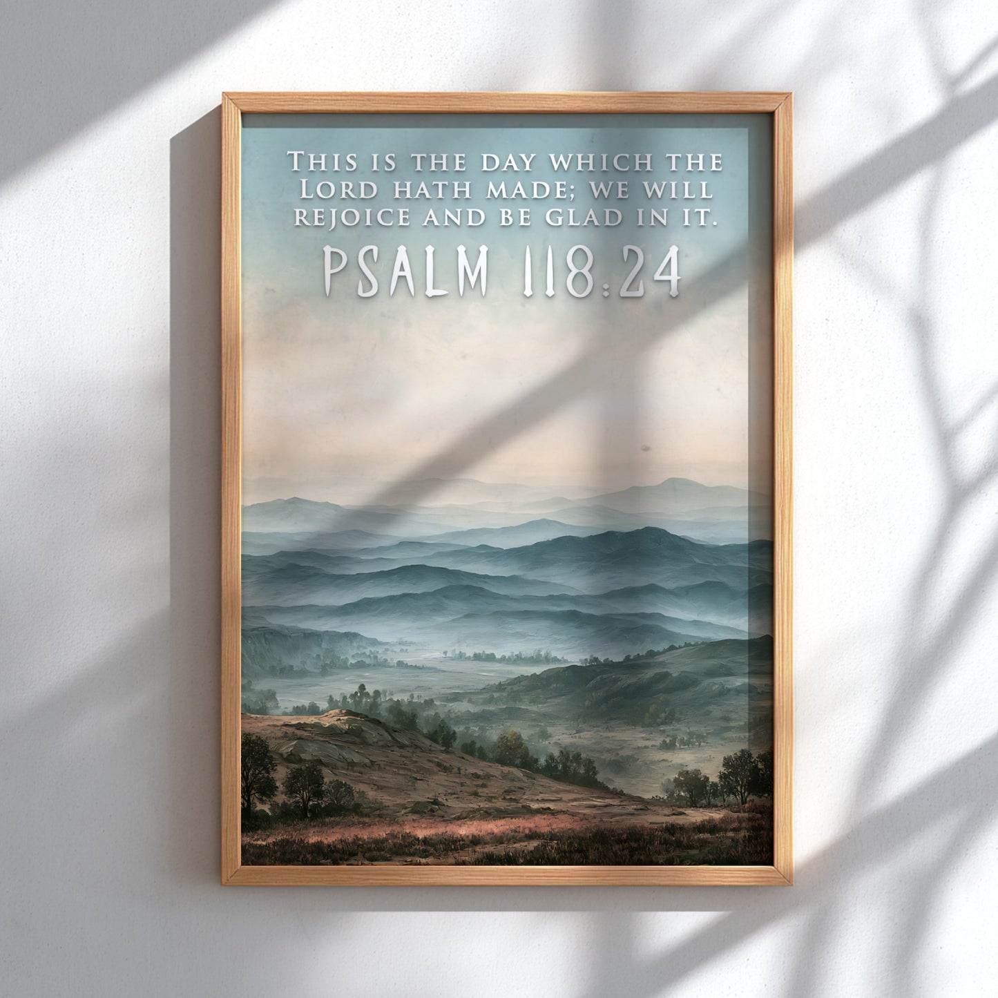 Poster featuring a misty blue mountain range with the quote Psalm 118:24 above.