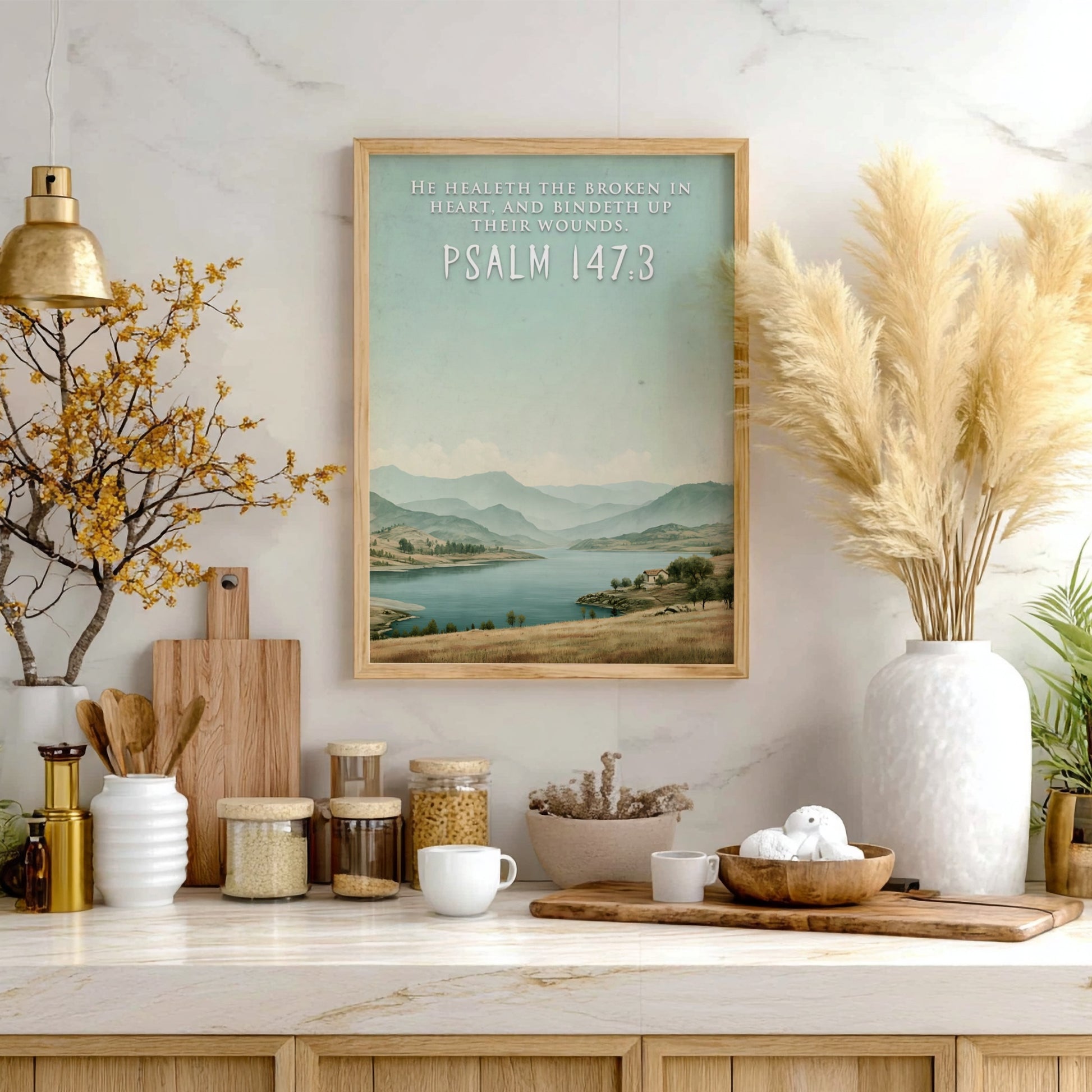 Poster featuring a serene lake and hills with the quote He Healeth the Broken