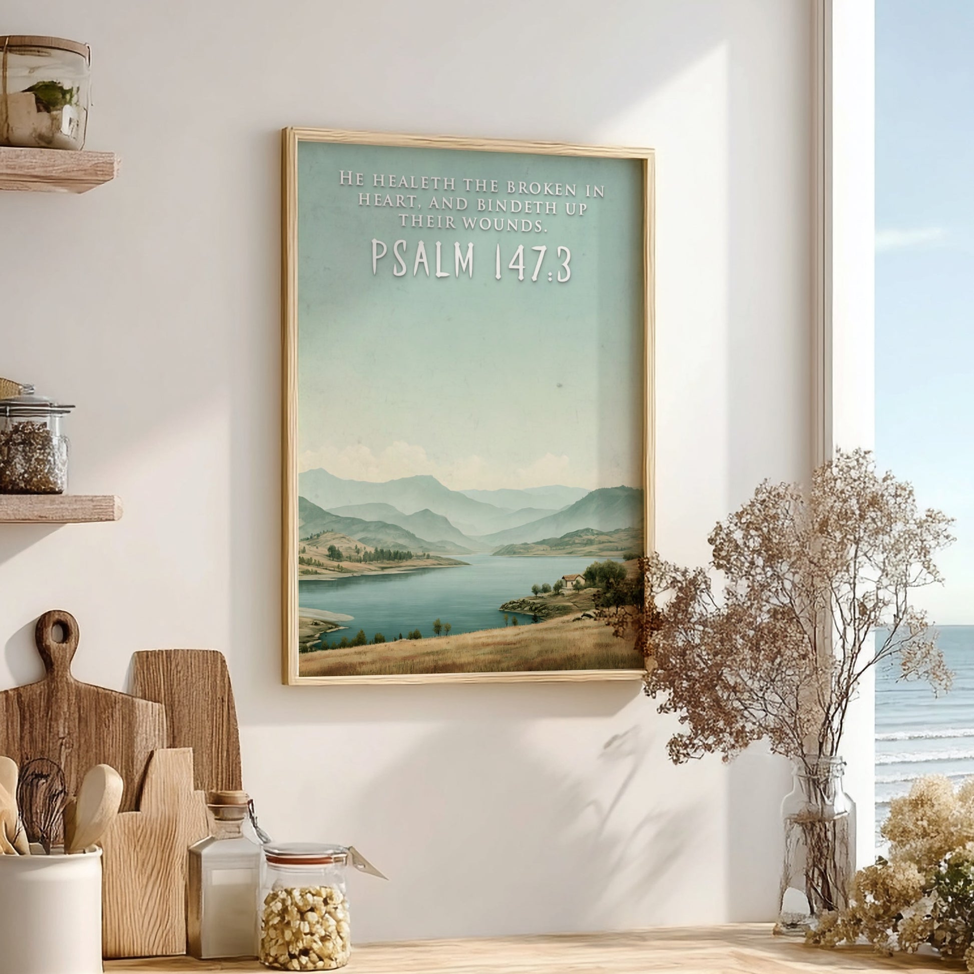 Poster featuring a serene lake and hills with the quote He Healeth the Broken