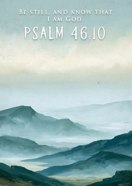 Poster featuring soft blue mountain ranges with the text Be Still And Know That I Am God.