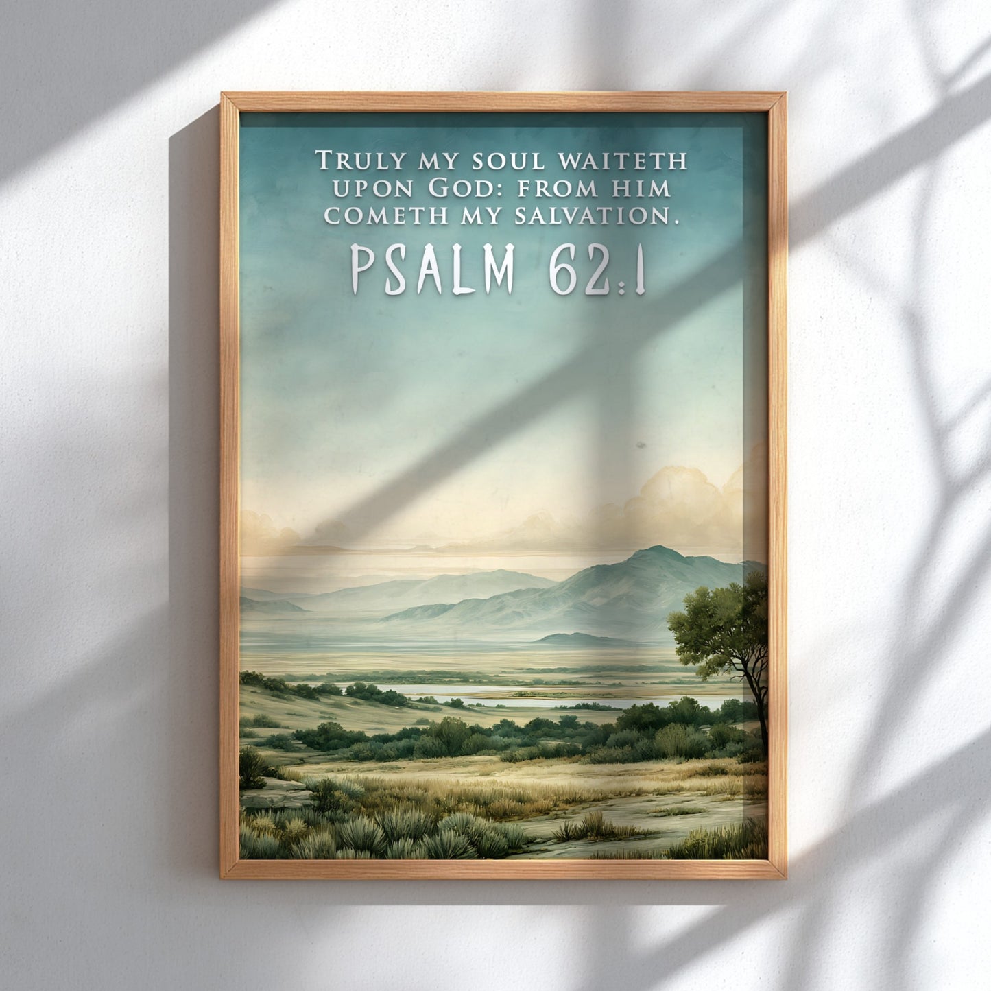 Poster displaying a serene landscape with rolling hills and the text Psalm 62:1