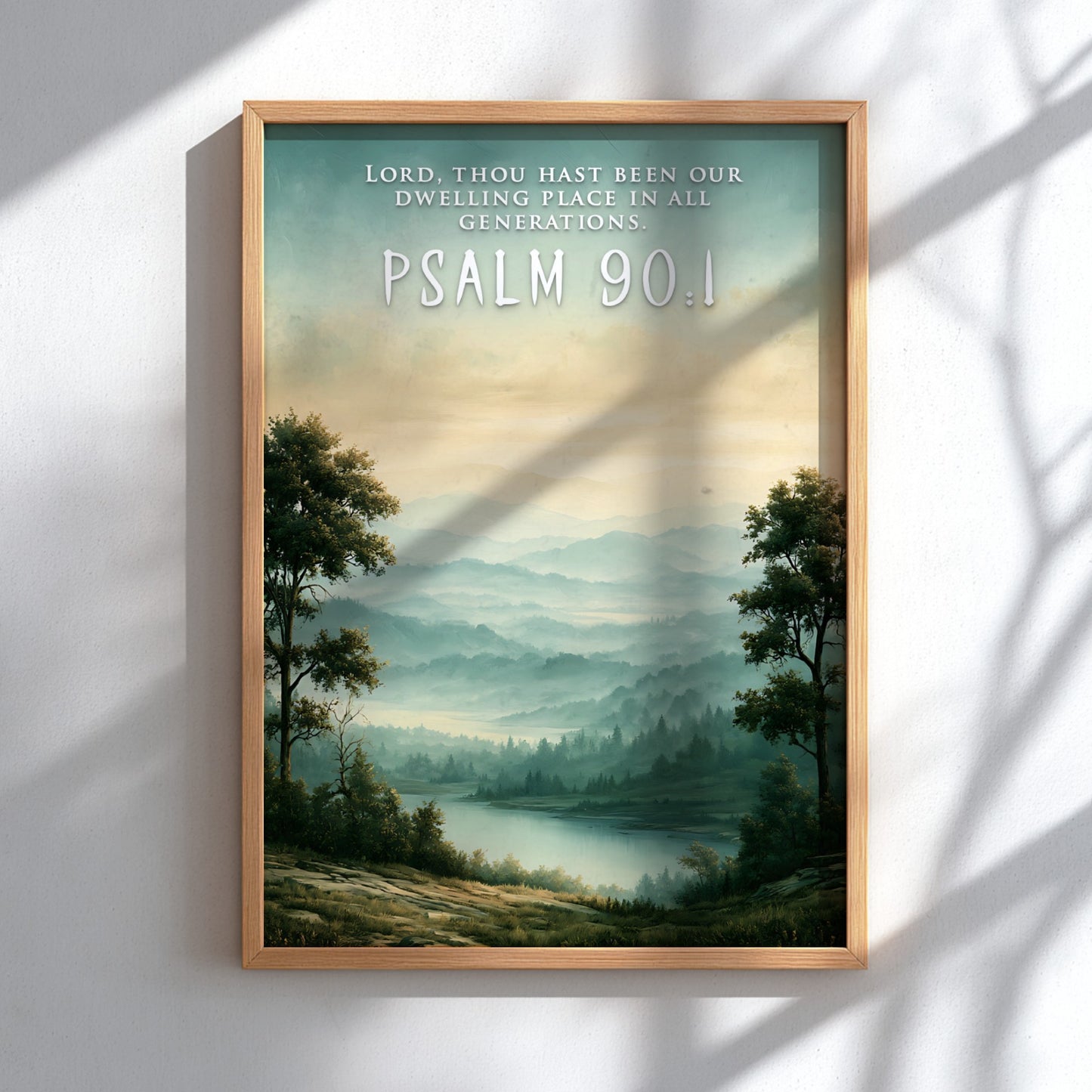 Psalm 90:1 poster featuring a misty mountain landscape with green hills and water.