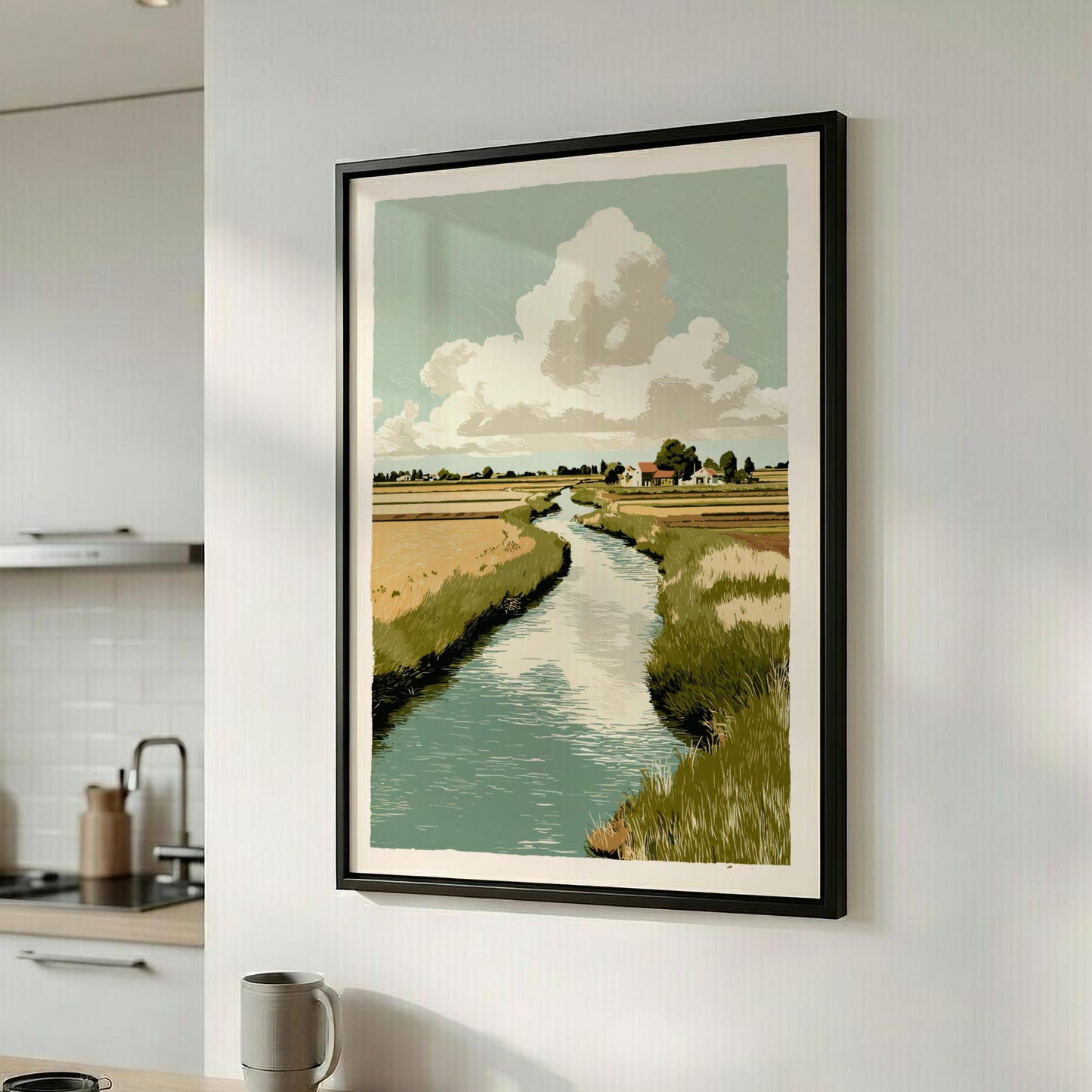 Framed landscape print of a river and sky in a modern kitchen.