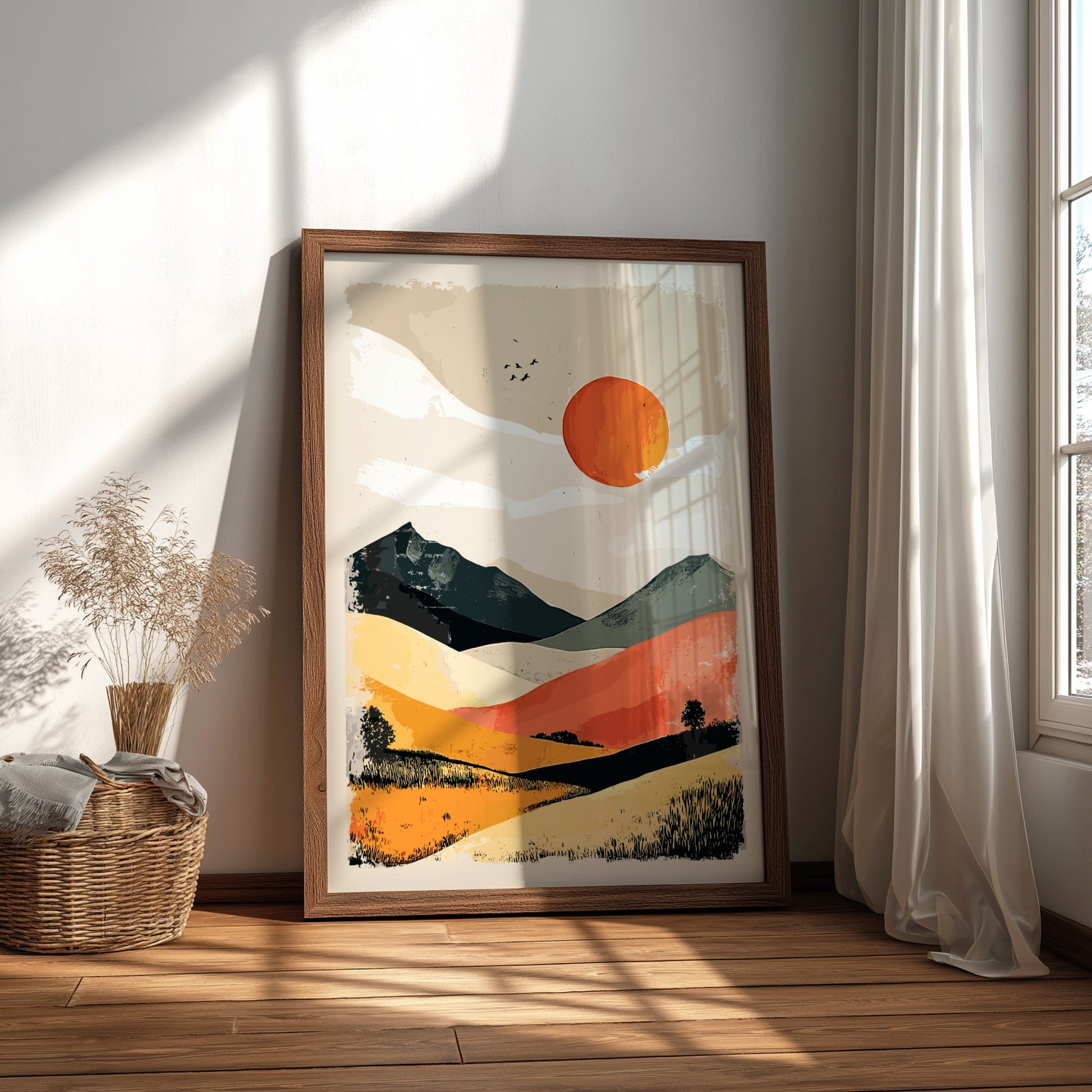 Framed abstract landscape art on a wall with natural light