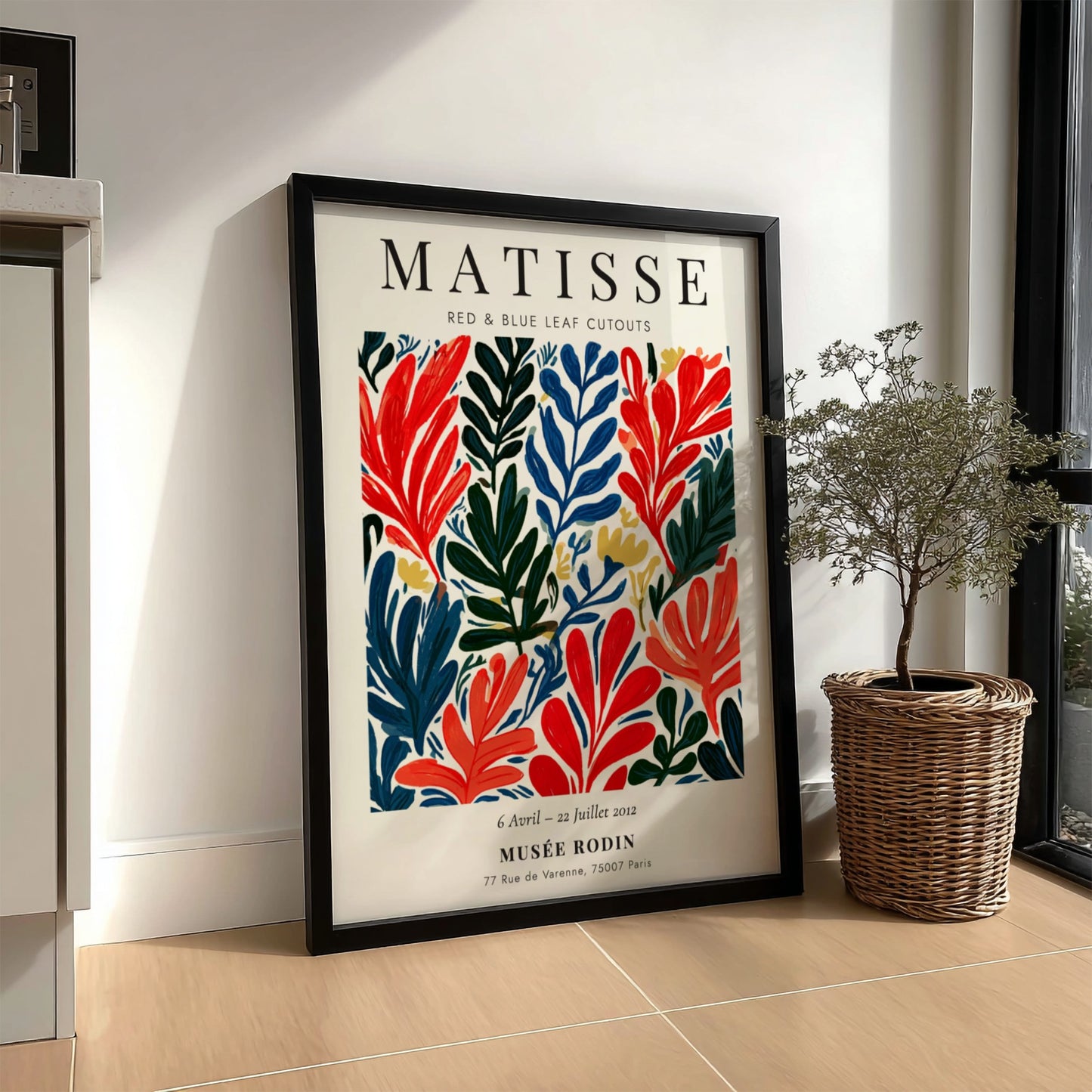 Henri Matisse poster featuring red and blue leaf cutouts in vibrant colors and bold style