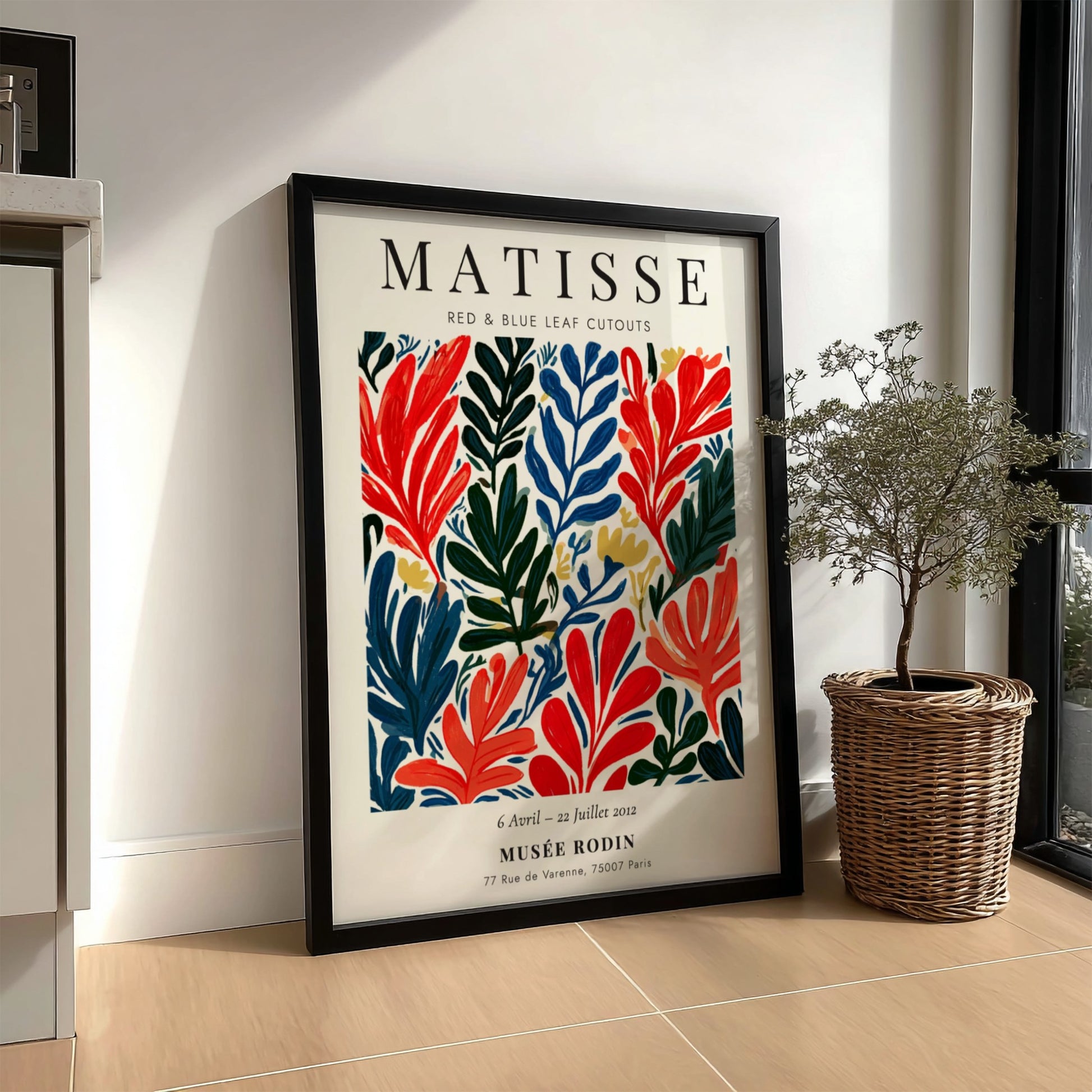Henri Matisse poster featuring red and blue leaf cutouts in vibrant colors and bold style