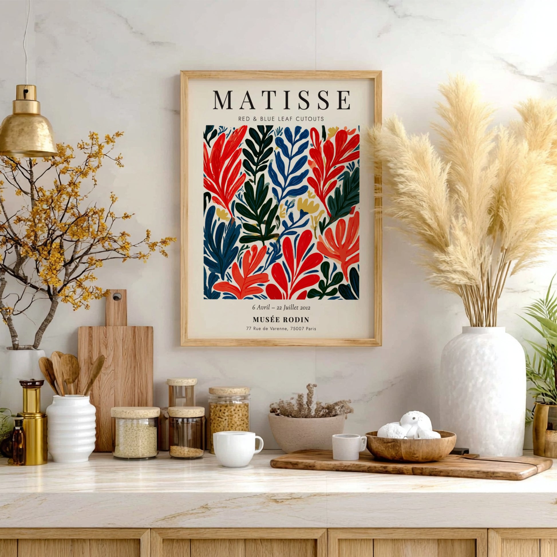 Henri Matisse poster featuring red and blue leaf cutouts in vibrant colors and bold style
