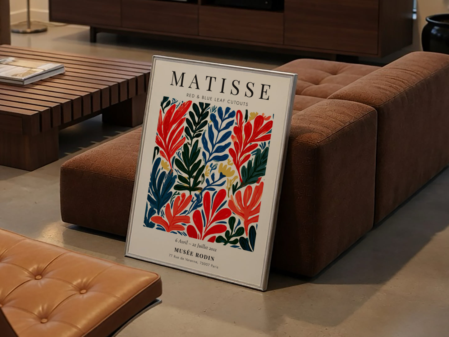 Henri Matisse poster featuring red and blue leaf cutouts in vibrant colors and bold style