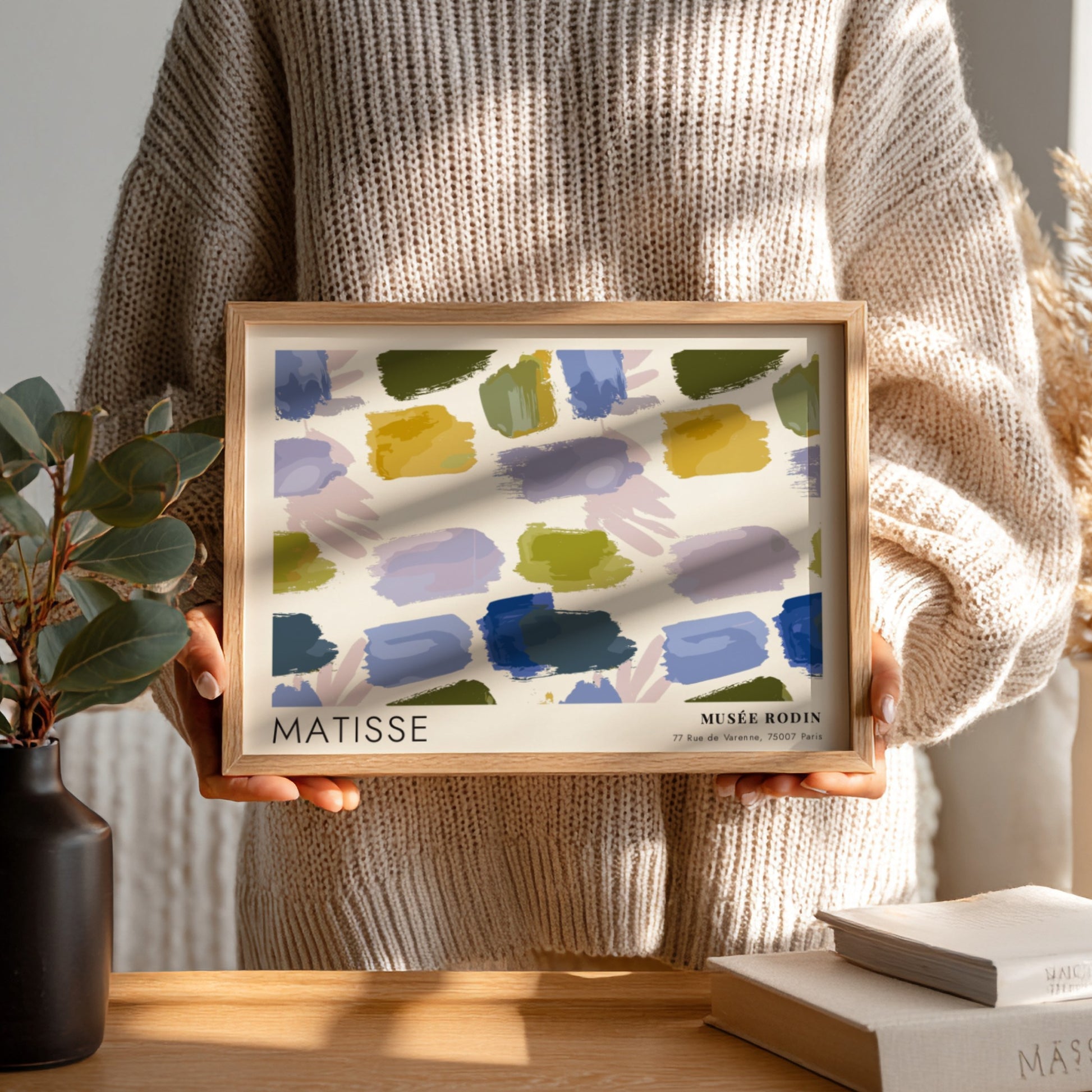 Henri Matisse poster featuring red and blue leaf cutouts in vibrant colors