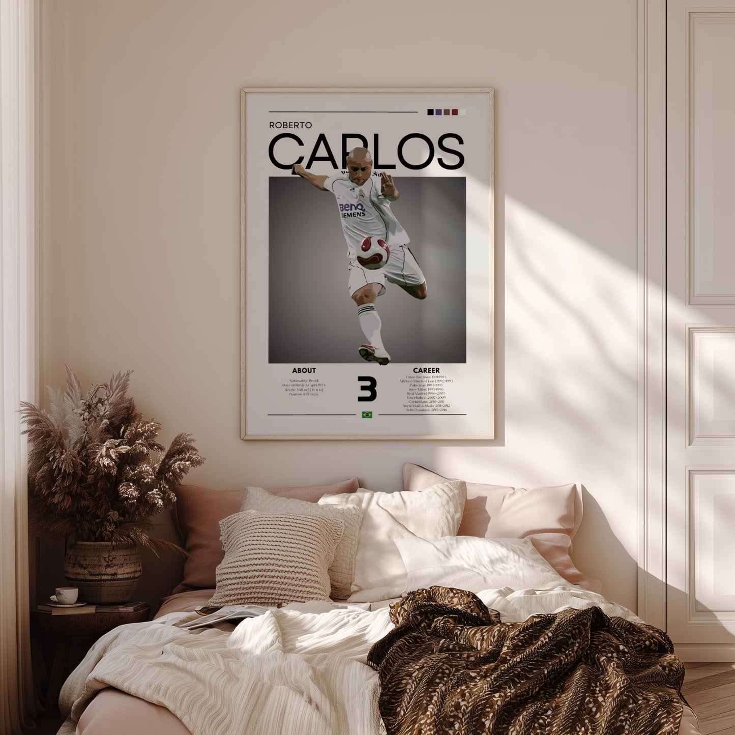 Poster of a soccer player named Carlos on a wall above a bed in a bedroom.