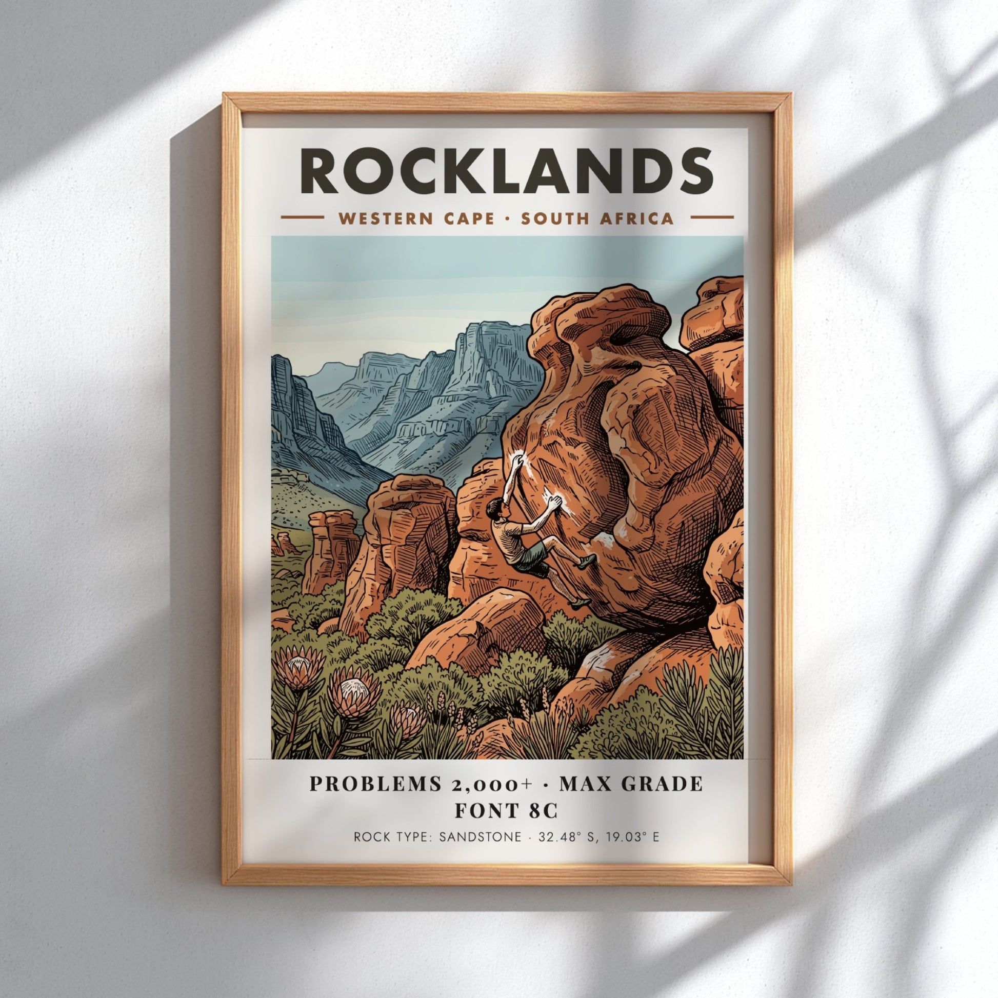 Rocklands climbing poster featuring a boulderer on orange sandstone in the Western Cape
