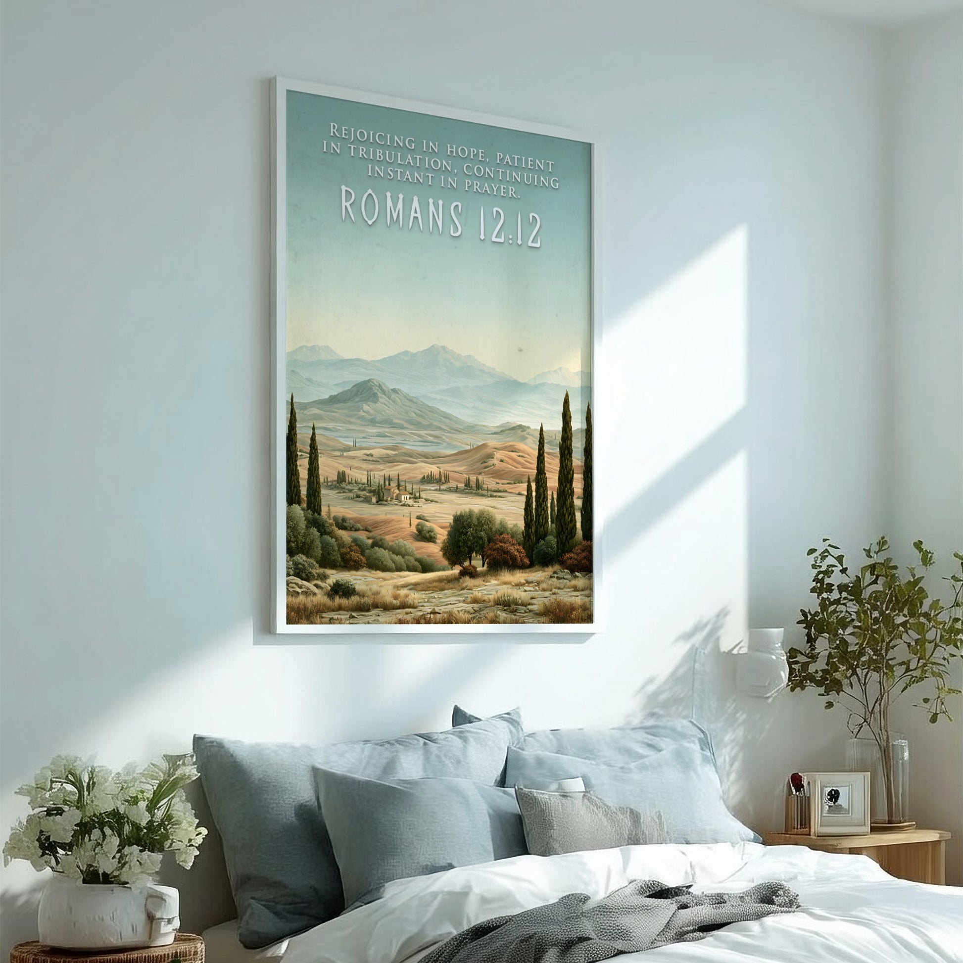 Poster displaying the Romans 12:12 quote over a scenic landscape of rolling golden hills.