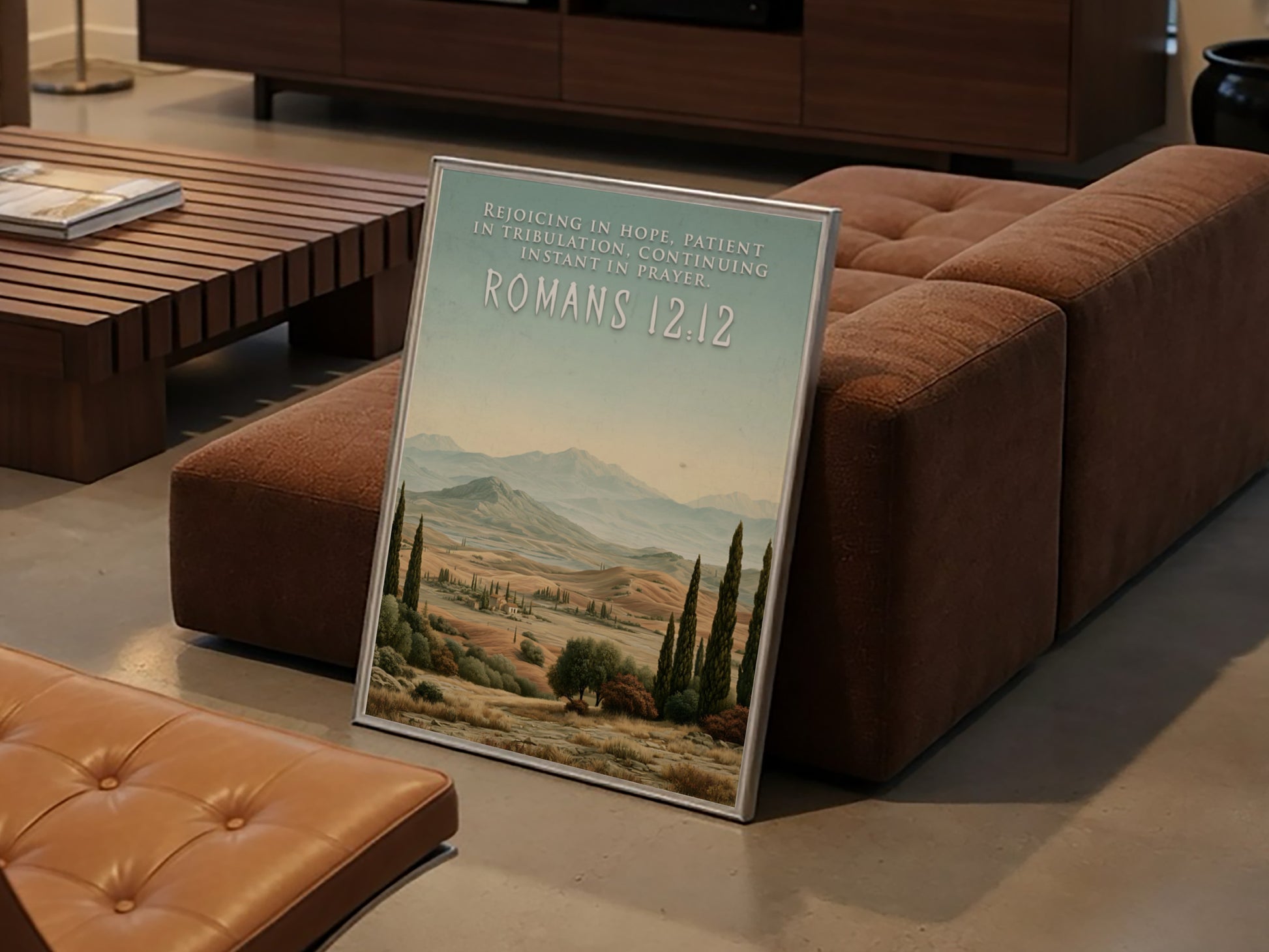 Poster displaying the Romans 12:12 quote over a scenic landscape of rolling golden hills.