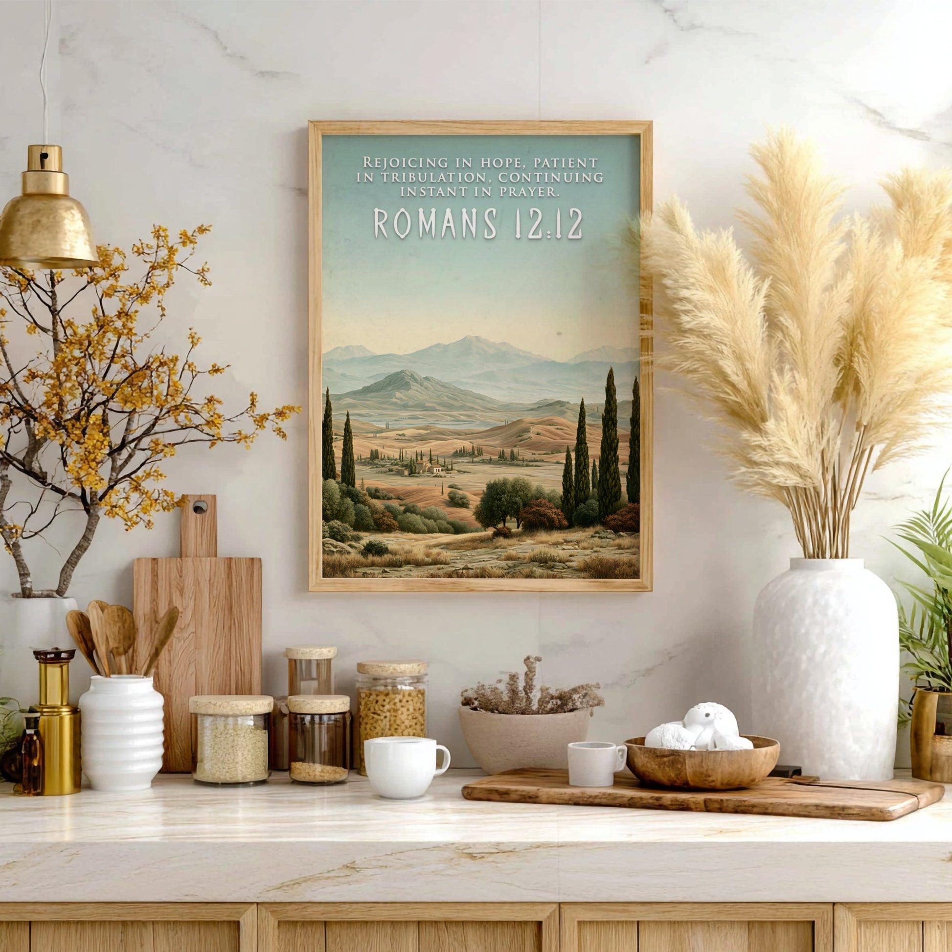 Poster displaying the Romans 12:12 quote over a scenic landscape of rolling golden hills.