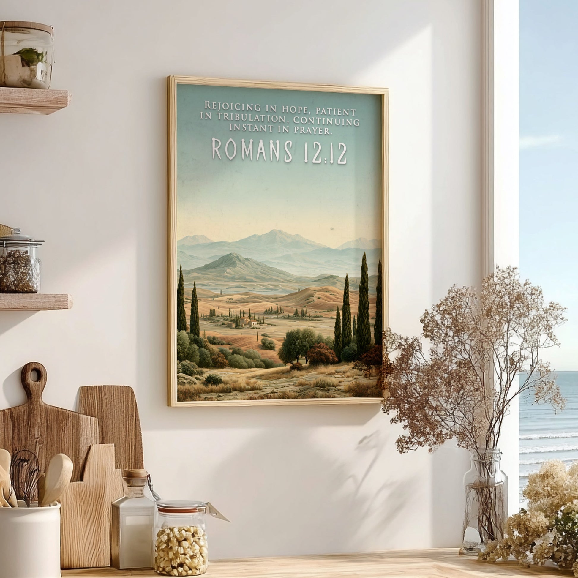 Poster displaying the Romans 12:12 quote over a scenic landscape of rolling golden hills.