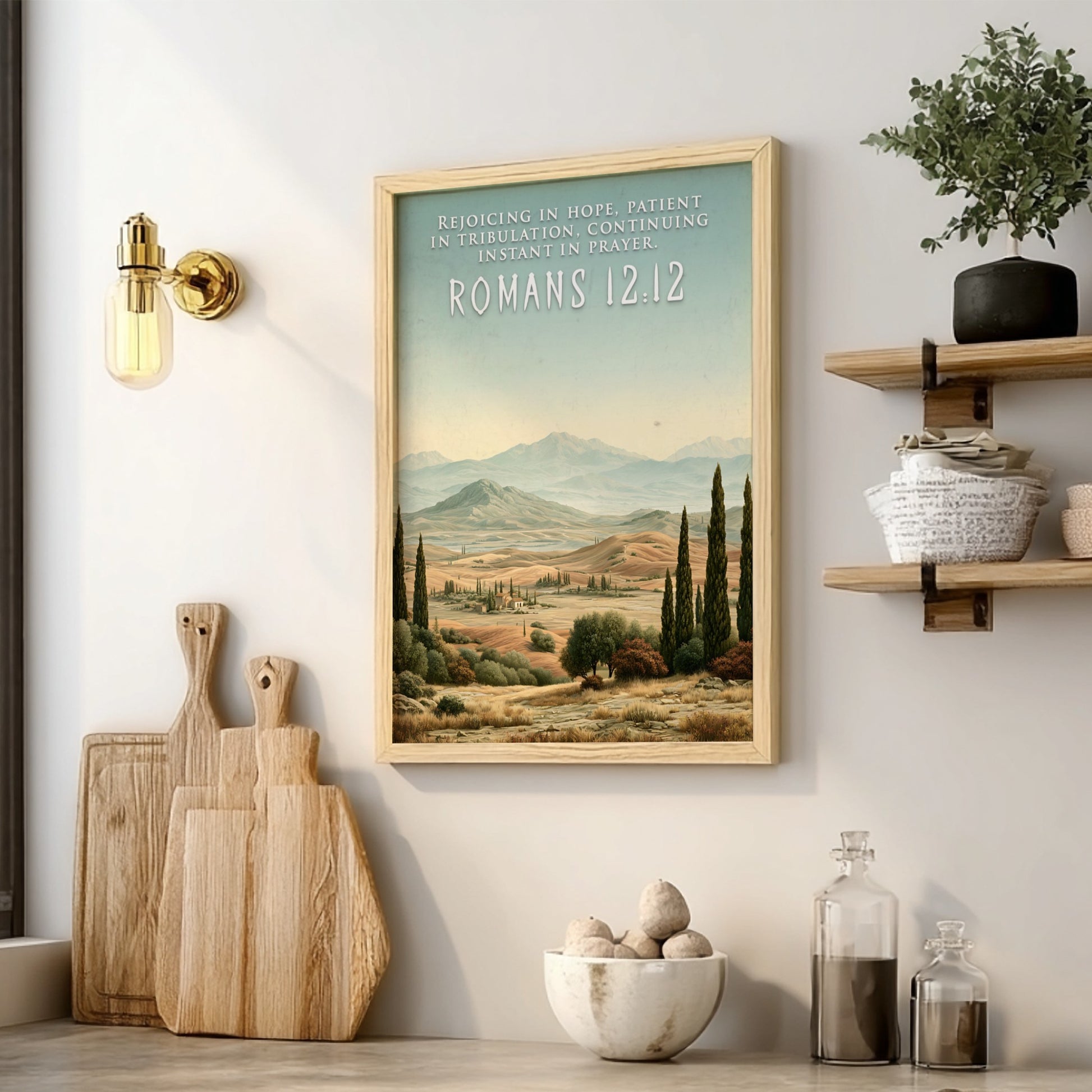 Poster displaying the Romans 12:12 quote over a scenic landscape of rolling golden hills.
