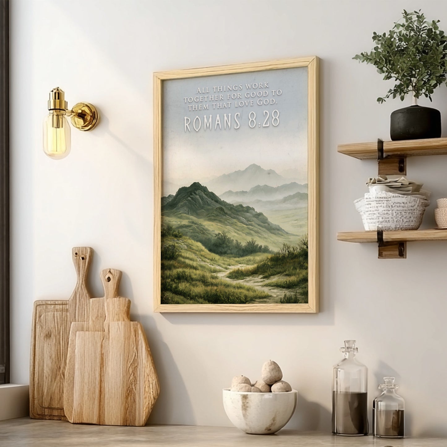 Poster featuring rolling hills and mountains with the text Romans 8:28 above them