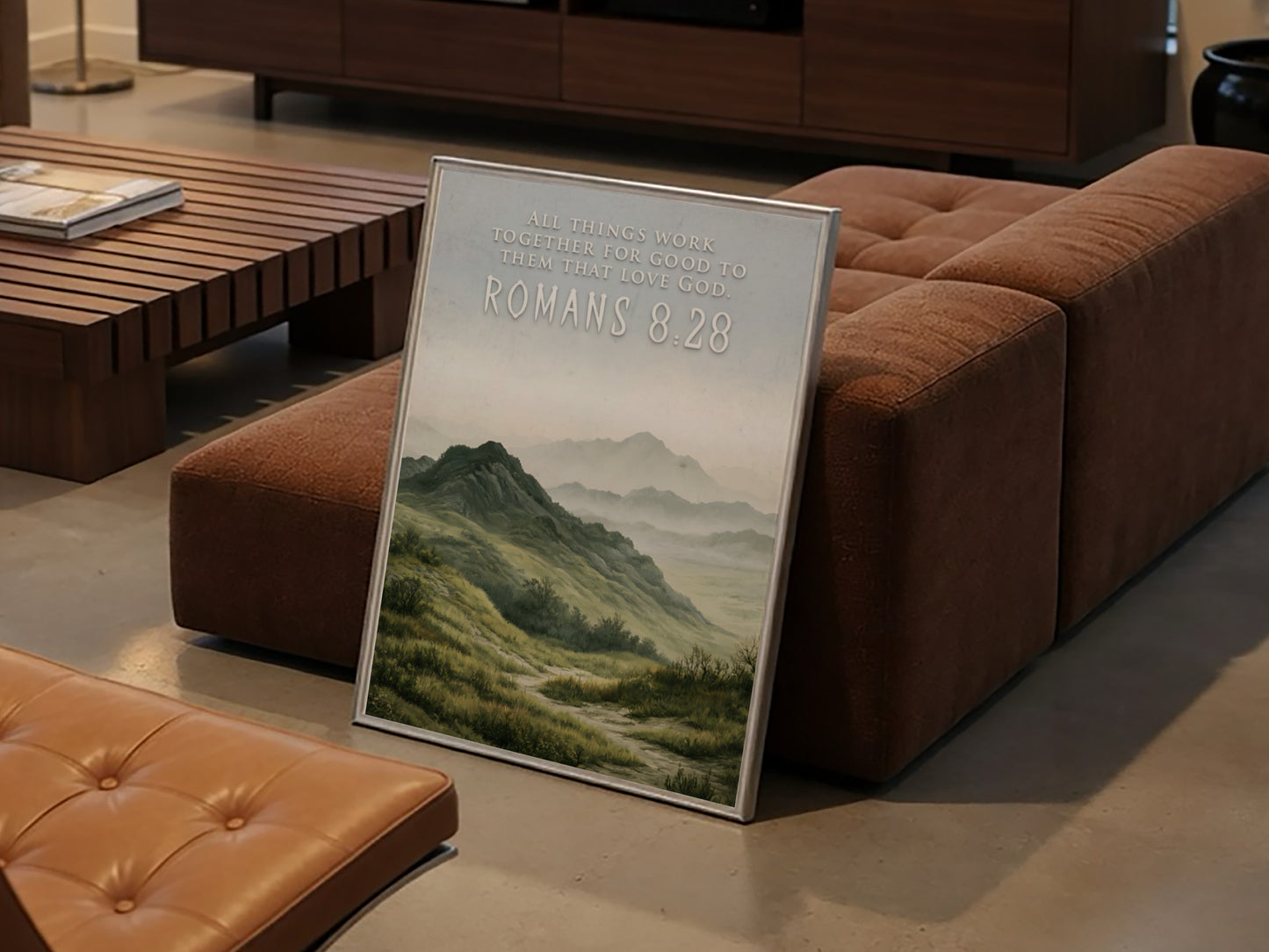 Poster featuring rolling hills and mountains with the text Romans 8:28 above them