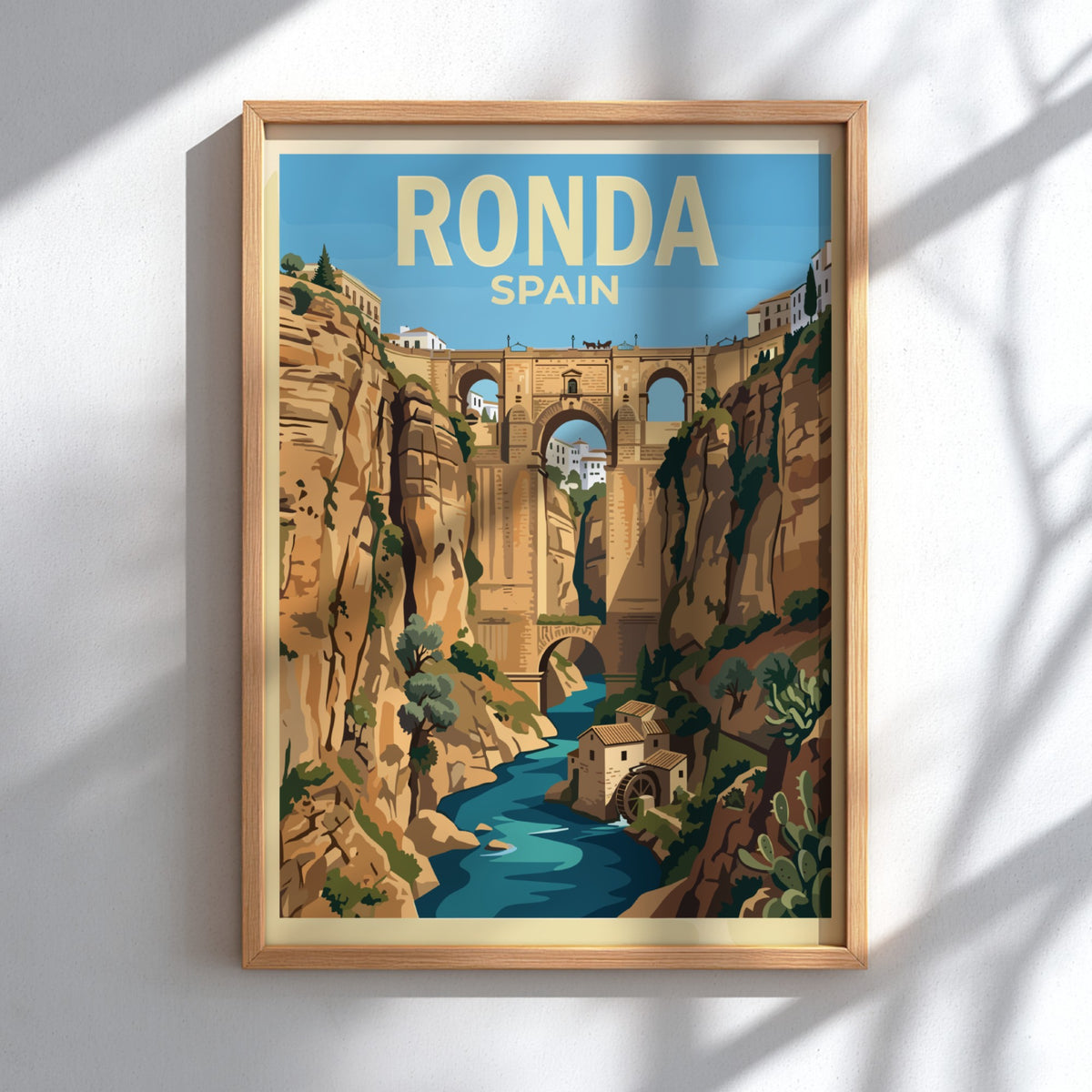 Poster of the Ronda Spain gorge featuring the famous bridge and stone buildings.