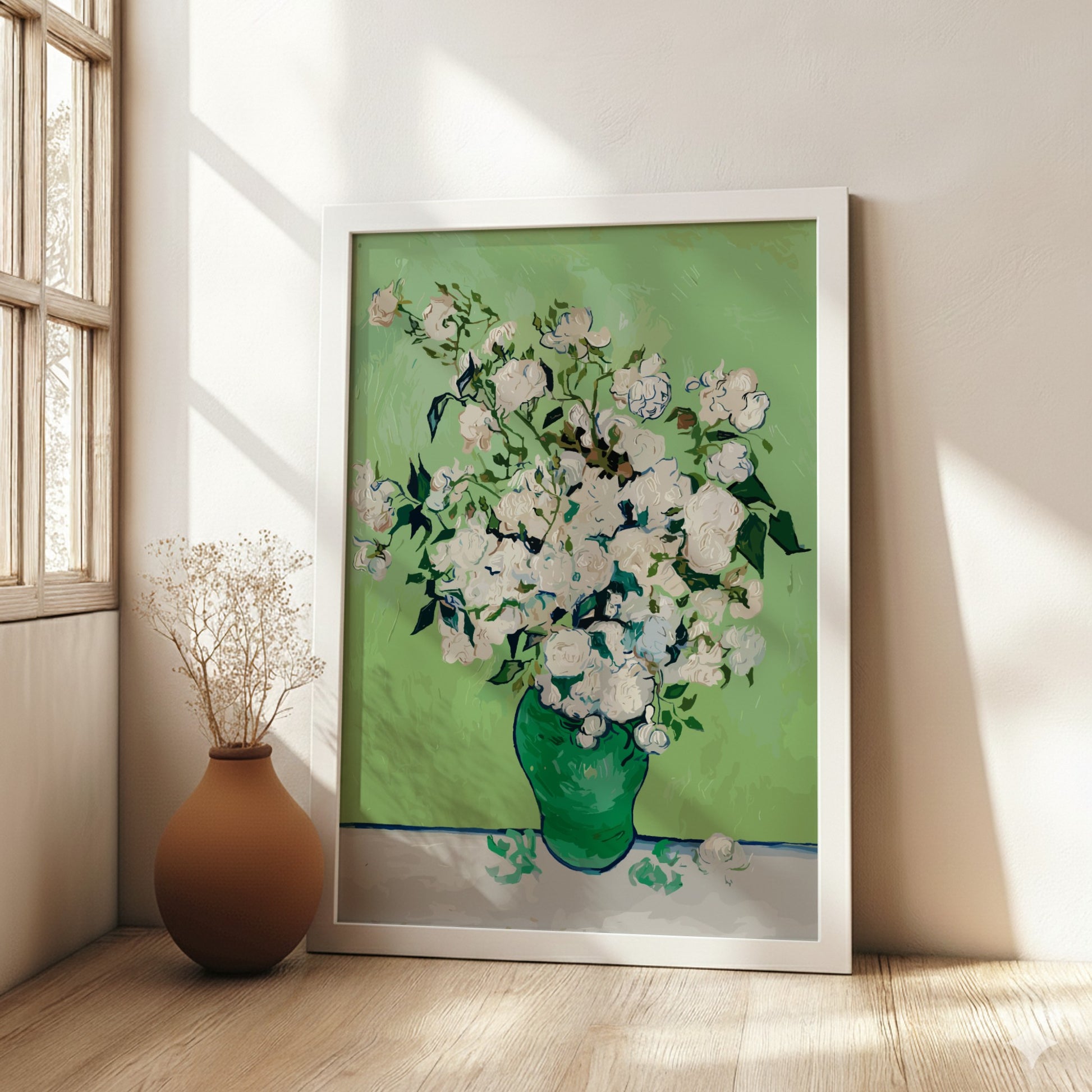 Vincent van Gogh's White Roses art poster in a green vase on a table.