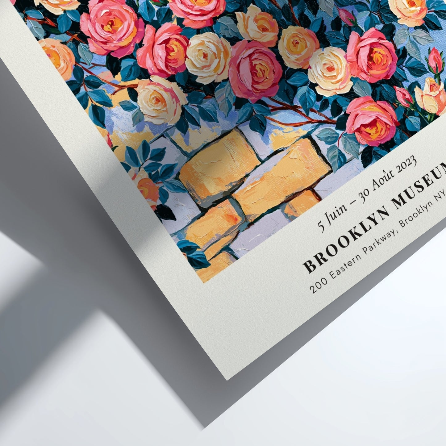 Monet-inspired wall art featuring vibrant roses and stone wall details