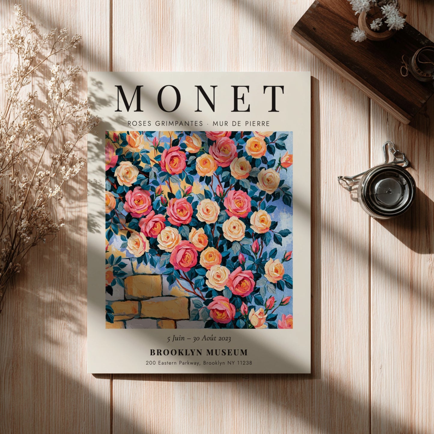 Monet-inspired wall art featuring vibrant roses and stone wall details