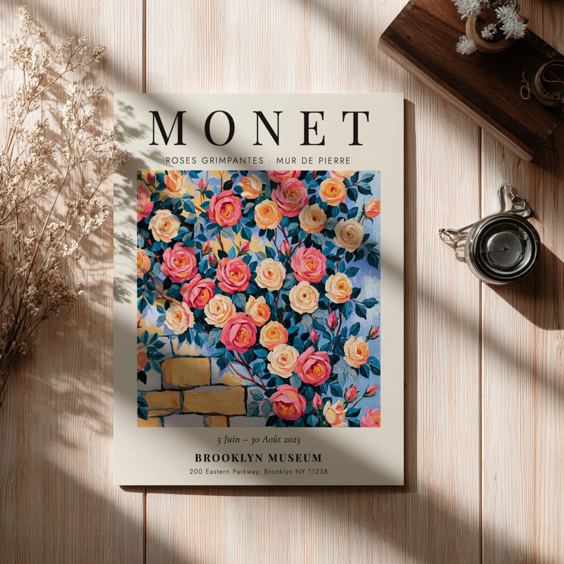 Monet-inspired wall art featuring vibrant roses and stone wall details