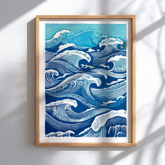 Framed artwork of blue and white wave pattern on a white wall