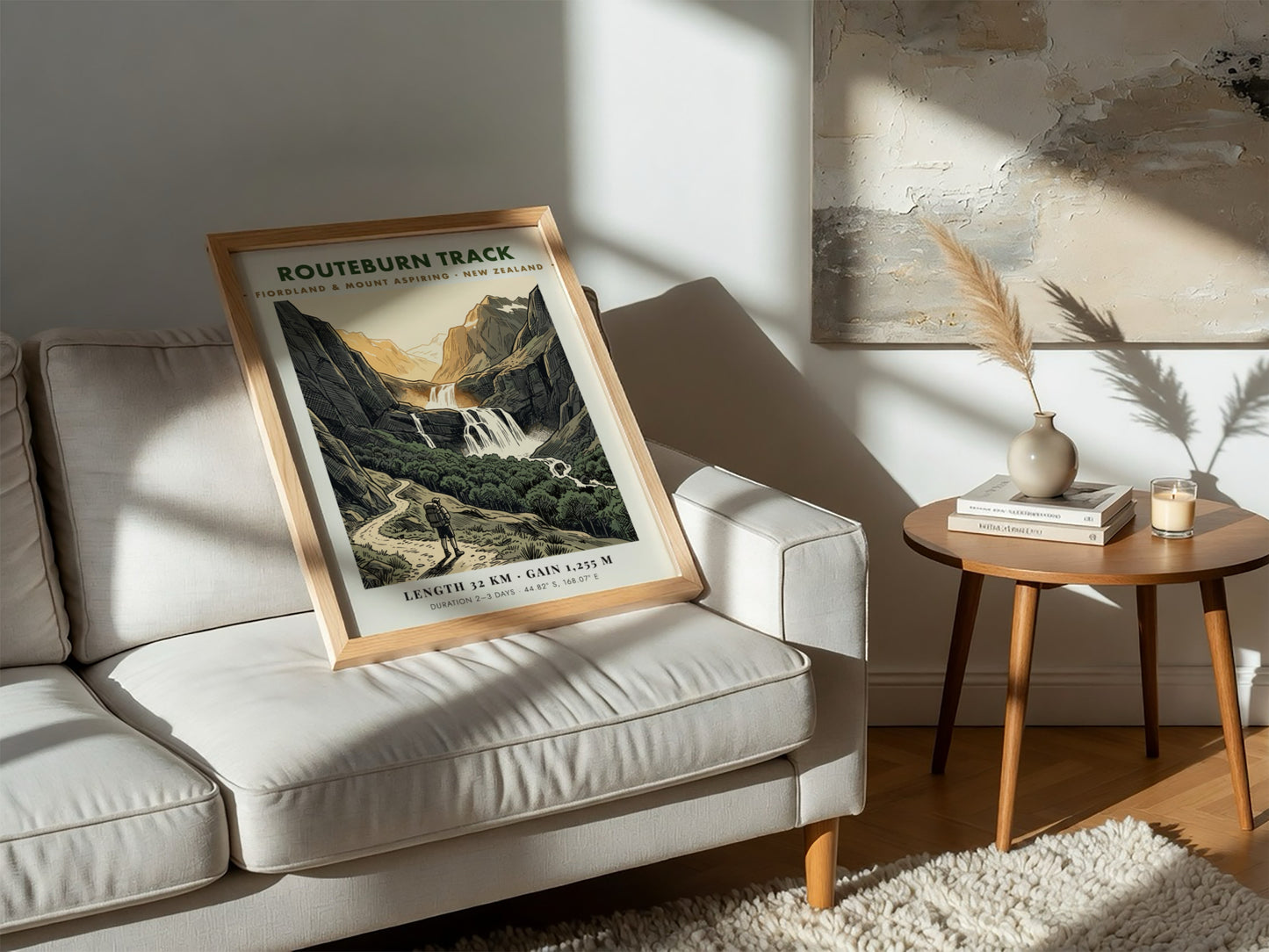 Poster featuring a hiker on the Routeburn Track beneath towering mountains and waterfalls.