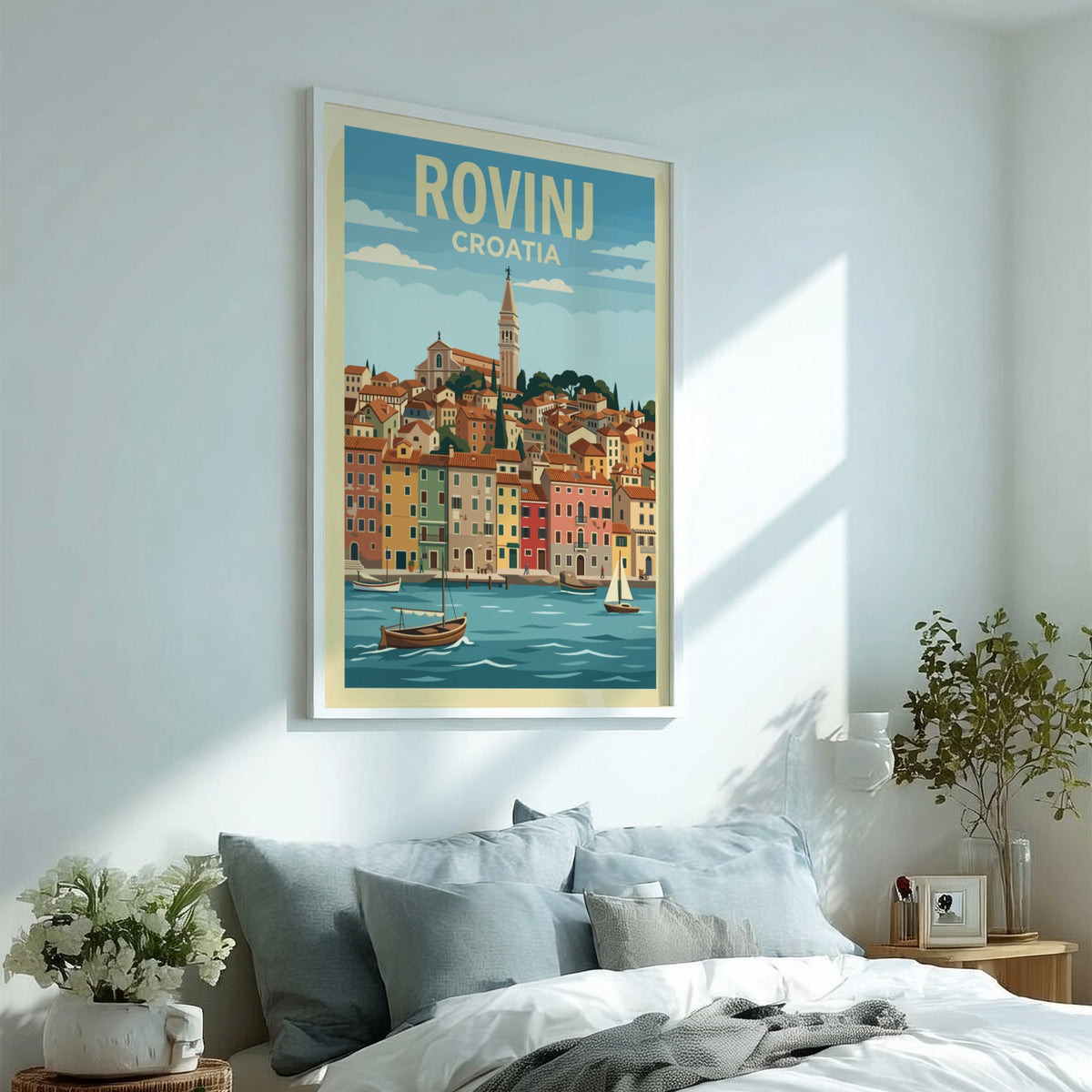 Poster of the Croatian city Rovinj featuring terracotta buildings, a bell tower, boats.