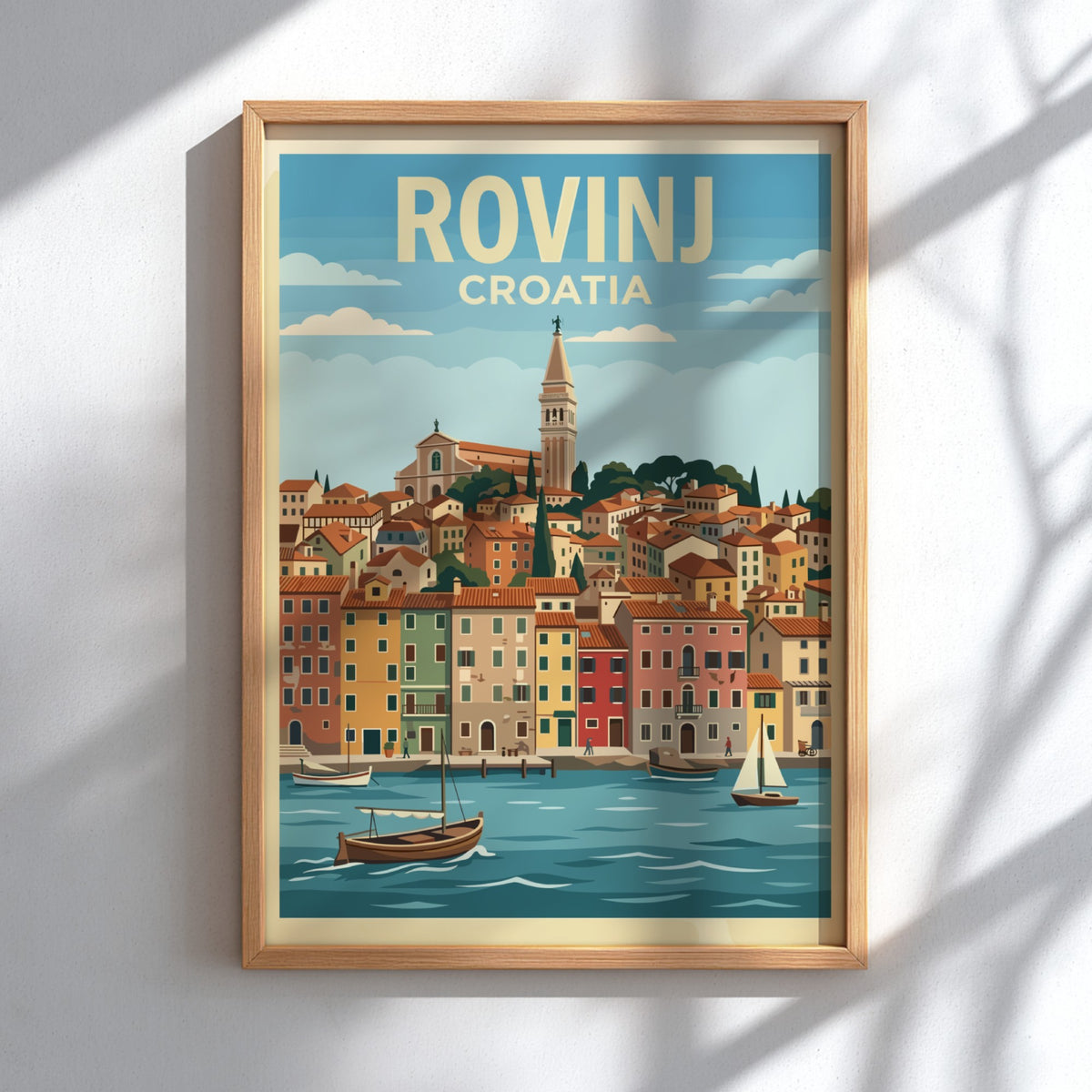 Poster of the Croatian city Rovinj featuring terracotta buildings, a bell tower, boats.